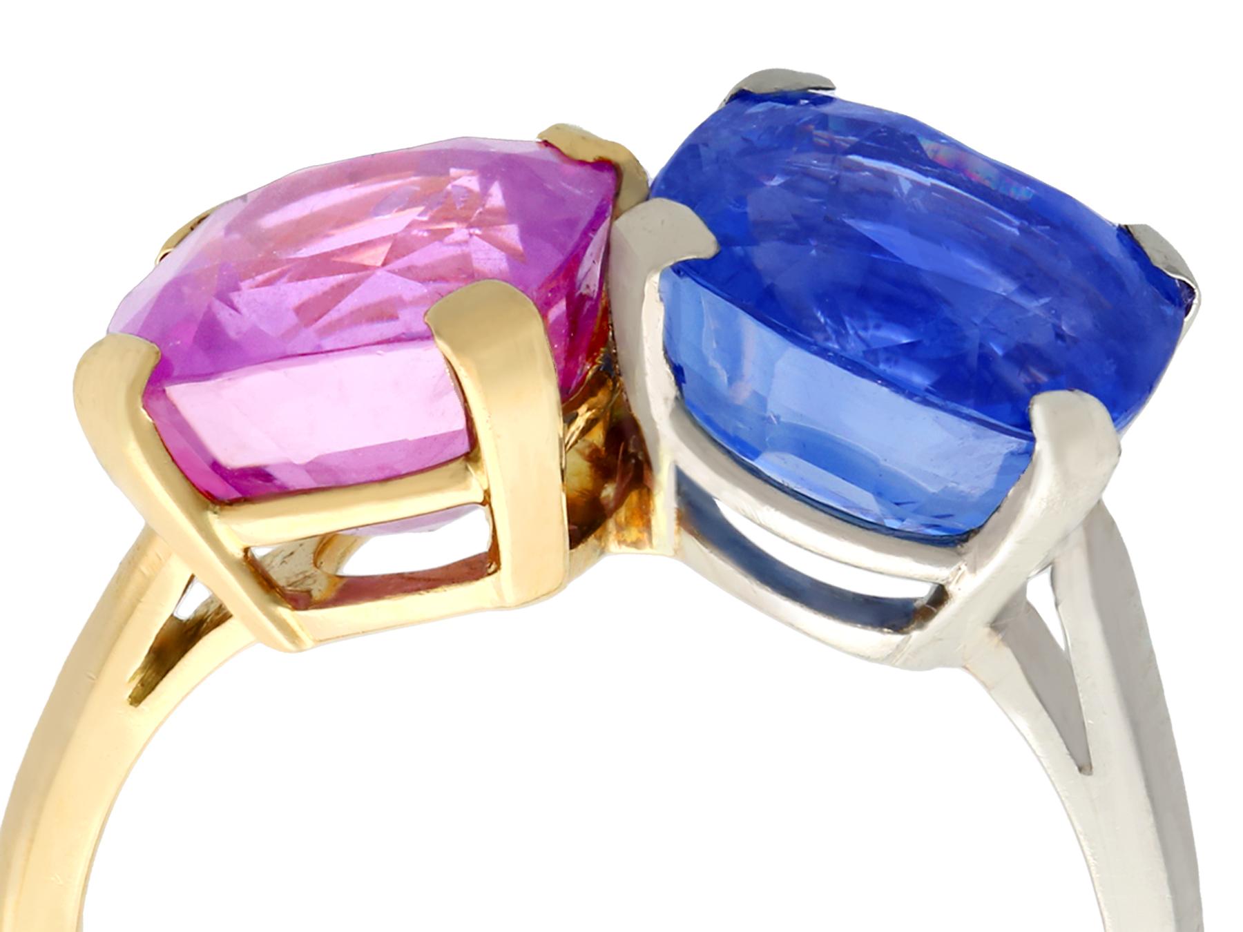 A stunning vintage 5 carat pink sapphire and 5.5 carat blue sapphire, 18 karat  yellow gold and platinum dress ring; part of our diverse vintage jewellery collections

This stunning, fine and impressive blue and pink sapphire ring has been crafted