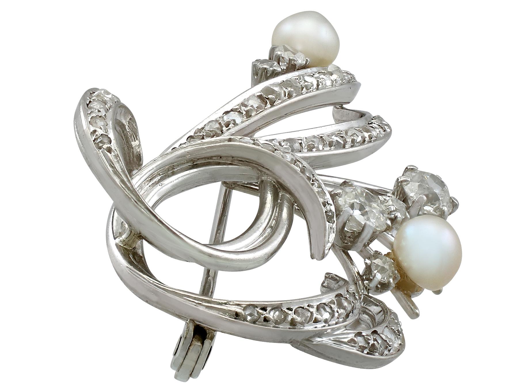 A stunning vintage 1940s 1.10 carat diamond and pearl, 18 karat white gold brooch; part of our diverse vintage estate jewelry collections.

This stunning, fine and impressive vintage pearl and diamond brooch has been crafted in 18k white gold.

The