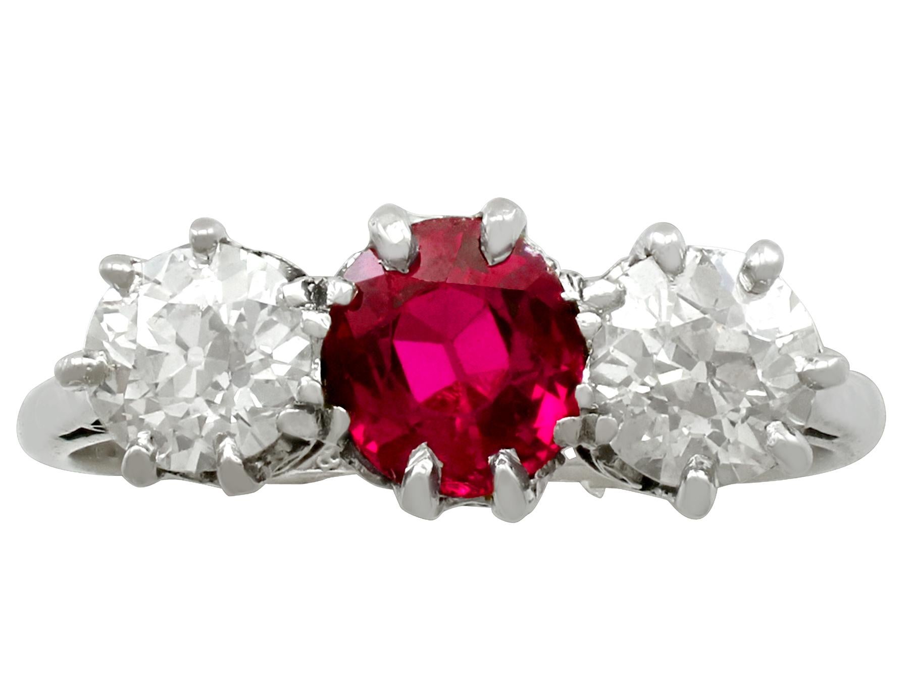 An impressive 1.23 carat ruby and 1.25 carat diamond, 18 karat white gold and platinum set three stone ring; part of our diverse vintage jewelry and estate jewelry collections.

This fine and impressive ruby and diamond three stone ring has been