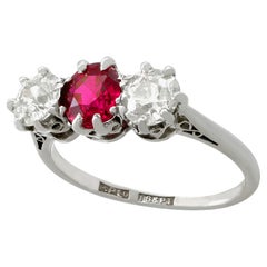 1940s 1.23 Carat Ruby 1.25 Carat Diamond Gold Platinum Set Three Stone Ring