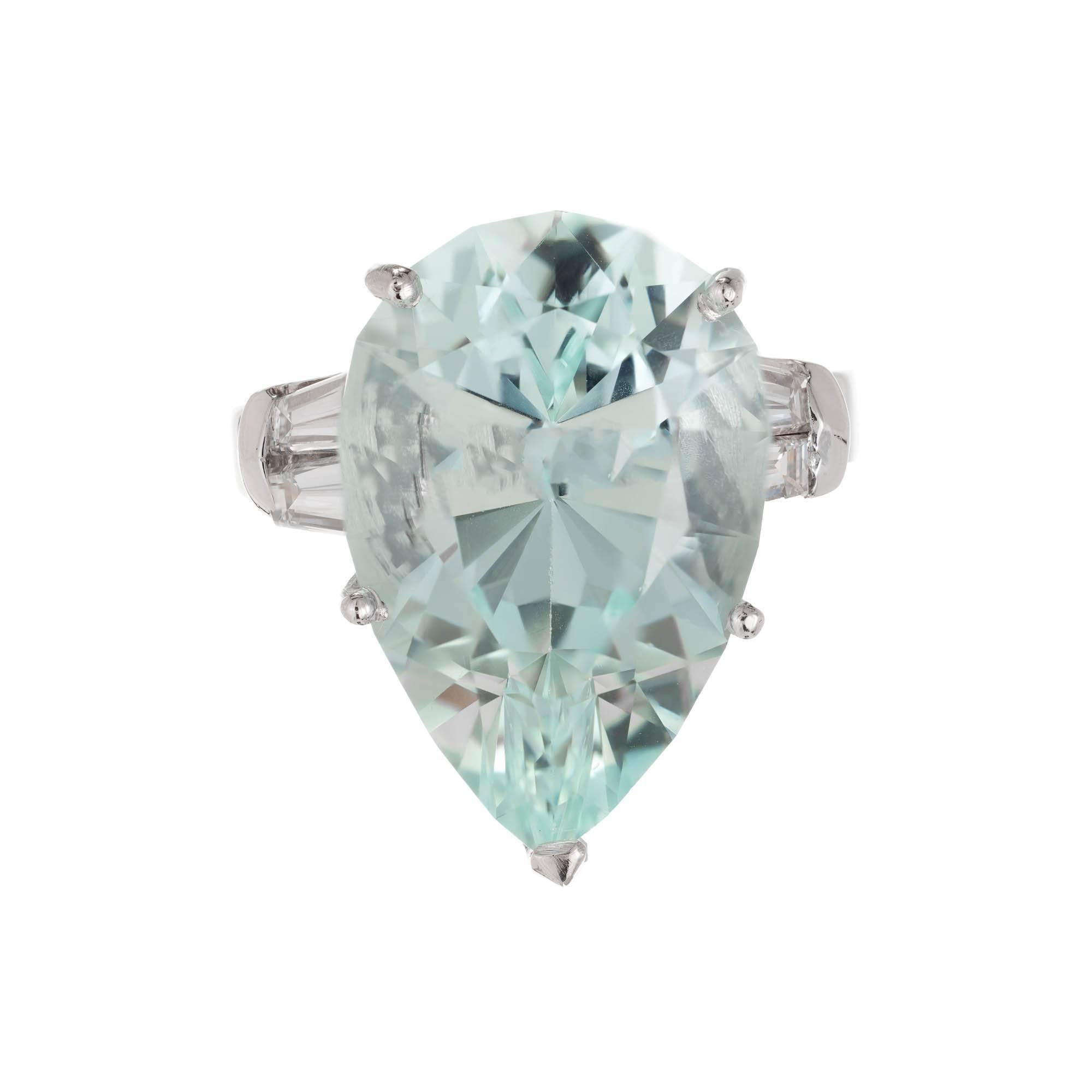 12.99ct Pear shaped Green bluer Aqua and diamond cocktail ring. Four baguette side diamonds. Solid Platinum. Circa 1940 to 1950. 

1 pear shaped light greenish blue Aqua, approx. total weight 12.99cts, VS, 20.35 x 13.60 x 10.05mm, GIA certificate