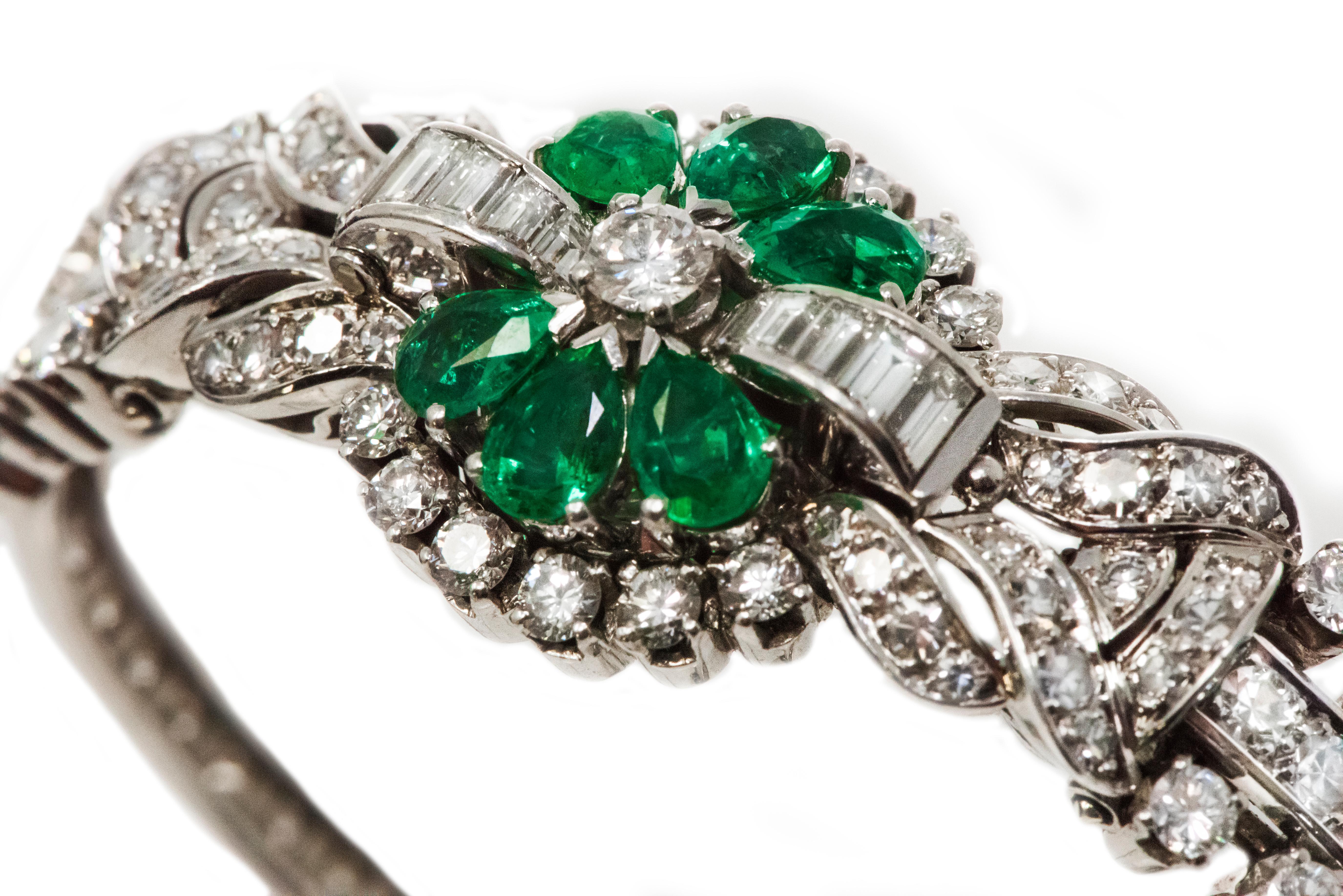 1940s 13 Carat Gubelin Platinum Emerald Diamond Flower Concealed Bracelet Watch In Excellent Condition In New york, NY