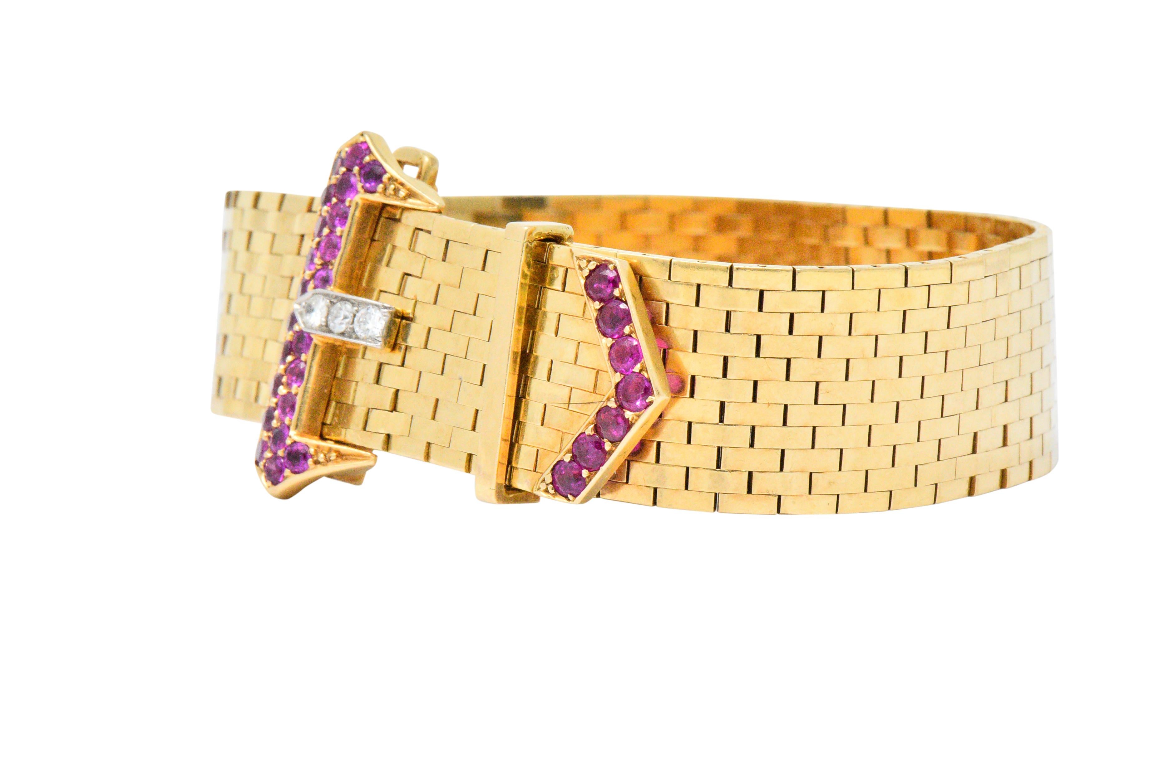 Featuring a highly polished, gold brick link bracelet with buckle

Buckle clasp set with round cut rubies and round cut ruby accents weighing approximately 1.25 carats, bright pinkish red

Additional round brilliant cut diamond accents weighing