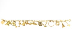 1940s 14 Karat Yellow Gold Whimsical Charm Bracelet