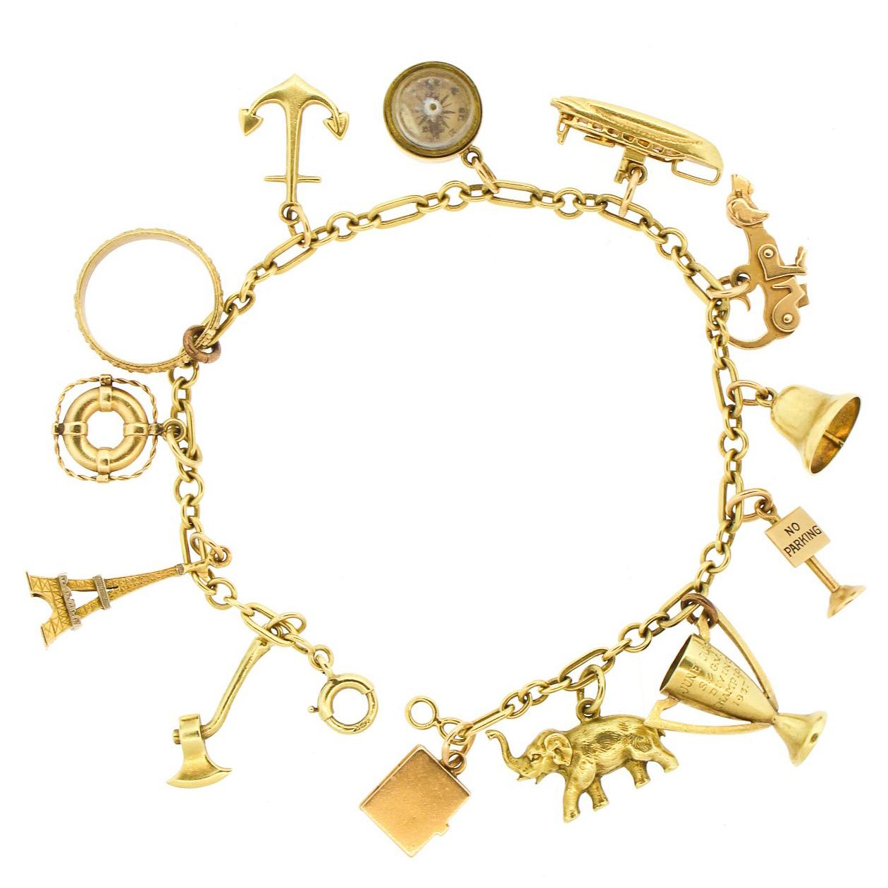 1940s 14 Karat Yellow Gold Whimsical Charm Bracelet