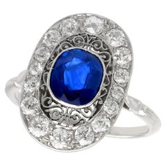 1940s 1.43 Carat Sapphire and Diamond Platinum Cocktail Ring