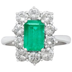 1940s 1.57 Carat Emerald and 1.72 Carat Diamond Cluster Engagement Ring