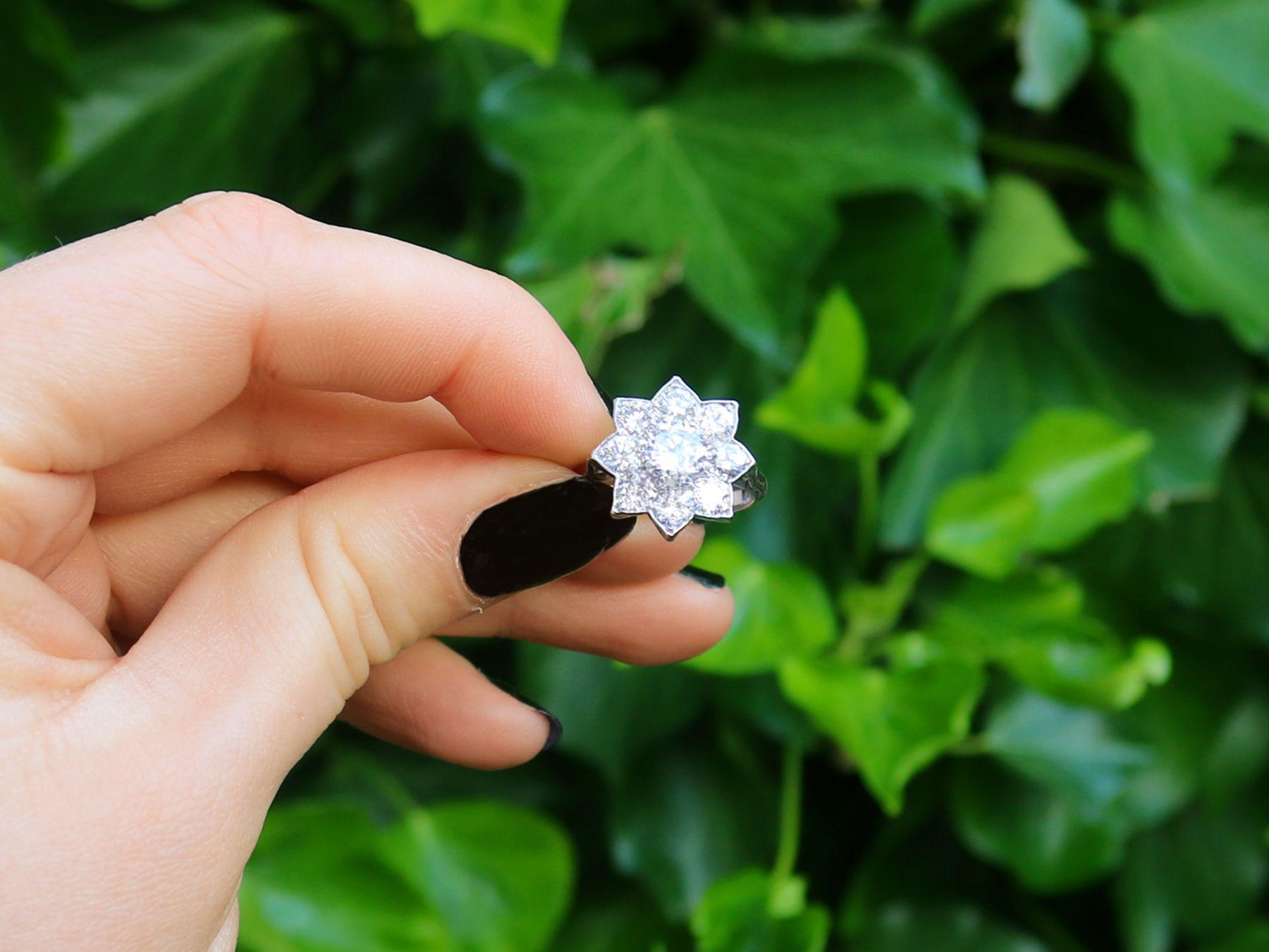 A stunning vintage 1940s 1.87 carat diamond and 18 karat white gold, platinum set floral cluster ring; part of our diverse diamond jewelry and estate jewelry collections.

This stunning, fine and impressive vintage diamond ring has been crafted in