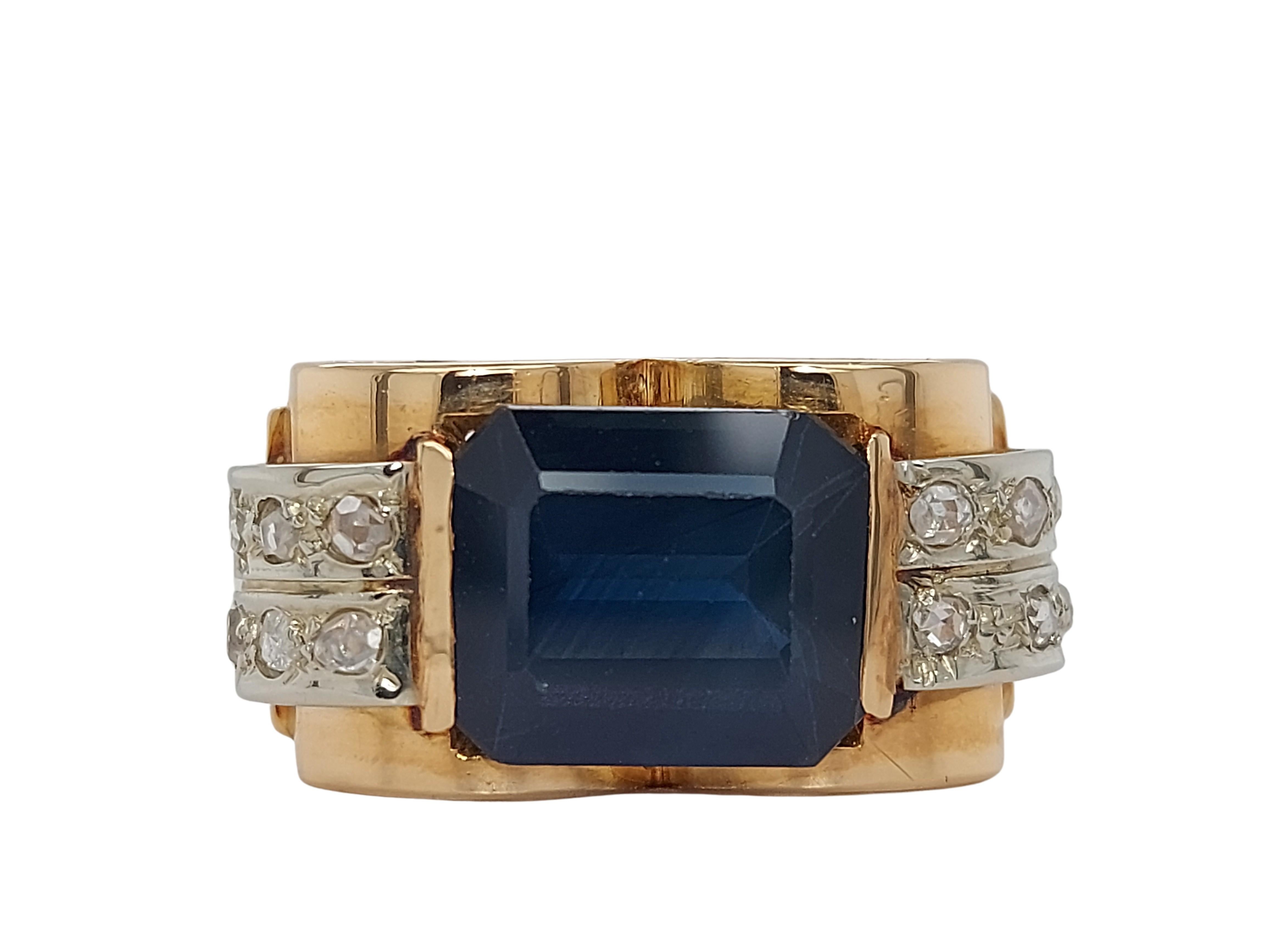 1940' s 18kt Yellow Gold & Platinum Ring With Ca. 3.50 ct Sapphire & Diamonds 

Sapphire: Emerald cut sapphire approx. 3.50ct

Diamonds: 12 rose cut diamonds

Material: 18kt yellow and platinum

Total weight: 9.0 grams / 0.315 oz / 5.80 dwt

Ring