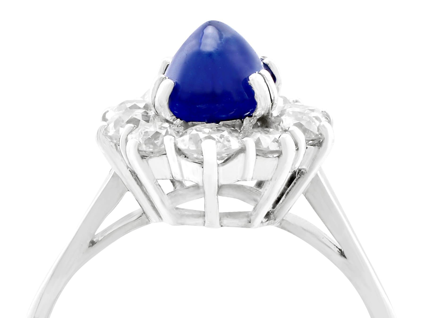 An exceptional, fine and impressive vintage 2.17 carat natural blue sapphire and 0.95 carat diamond, 18k white gold cocktail ring; part of our vintage jewelry and estate jewelry collections.

This exceptional, fine and impressive cabochon cut