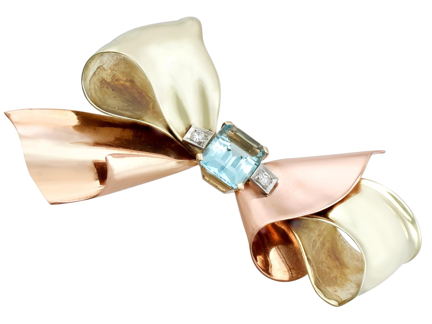 A stunning vintage 1940's 3.26 carat aquamarine and 0.08 carat diamond, 14 carat rose, yellow and white gold 'bow' brooch; part of our diverse vintage jewellery collections.

This stunning, fine and impressive aquamarine bow brooch has been crafted