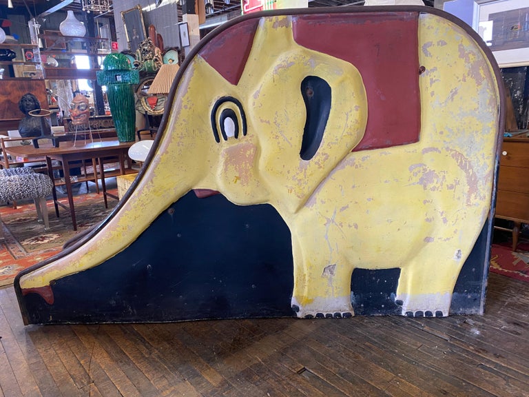 Vintage 1940's-1950's Elephant themed playground slide. Garden ornament, sculpture. Children's outdoor slide retaining painted elephant to both sides, steel steps, stainless slide. Age appropriate wear and patina, minor damage to shell. (see photo).