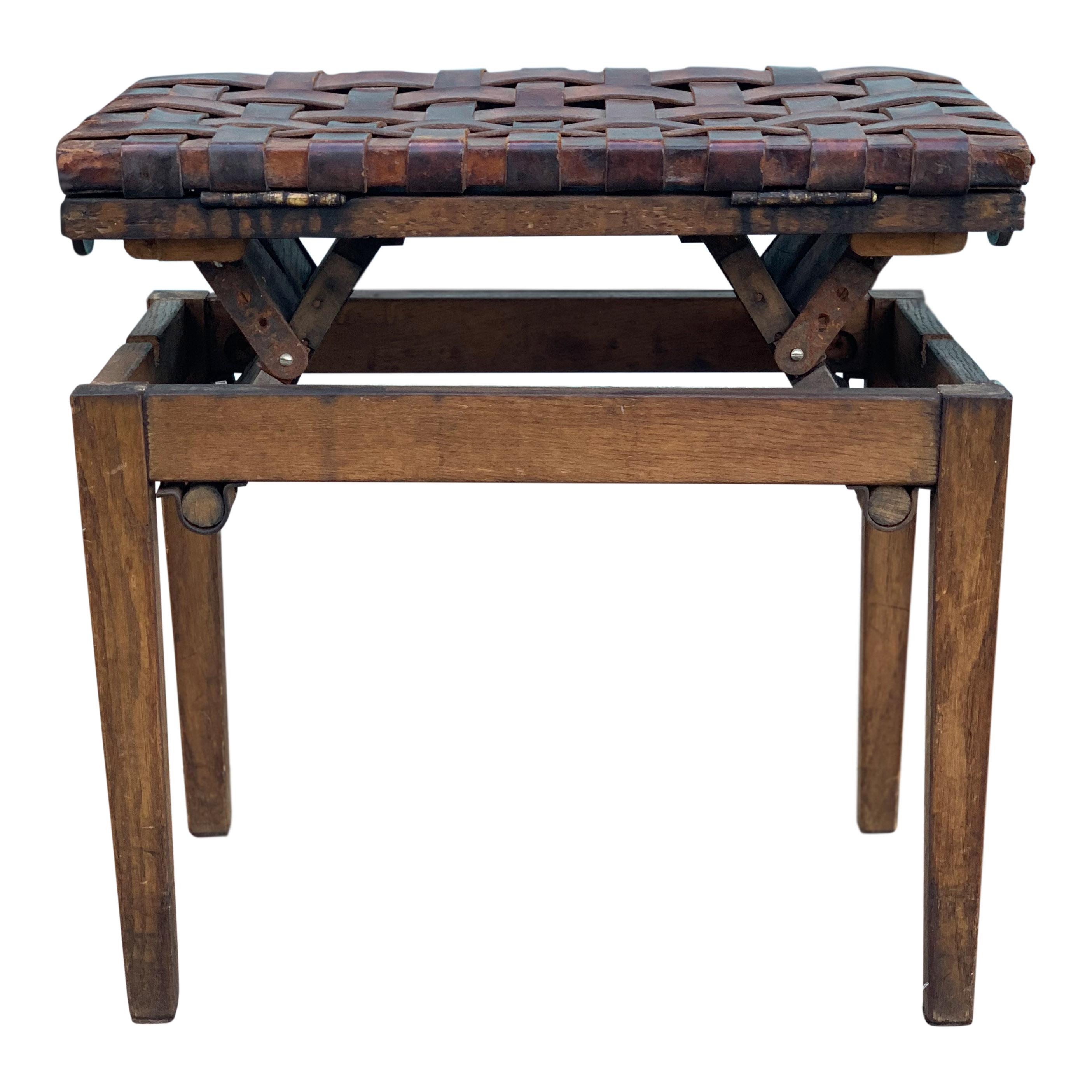 A 1940s Piano stool with original woven leather seat and mechanism for winding the seat higher or lower. The stool has been beautifully engineered and could make a very practical piece for the home.


Measurements have been taken from the stool