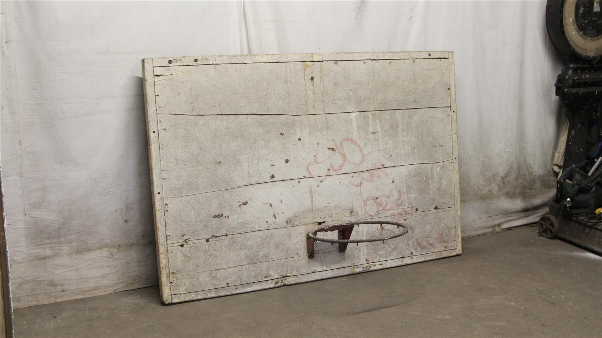 Adjustable wooden distressed basketball backboard from a Manhattan court in NYC. With original paint. This can be seen at our 400 Gilligan St location in Scranton, PA.