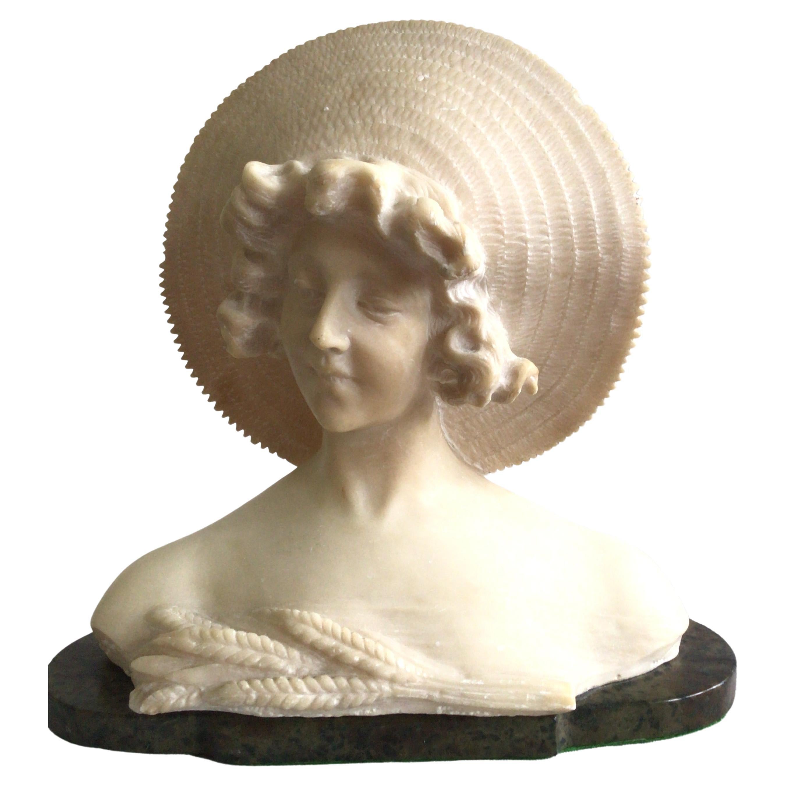 Busto de alabastro de mujer joven de los años 40 sobre base de mármol