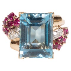 1940s American 8 Carat Acquamarine and 14k Gold Ring with Rubies and Diamonds