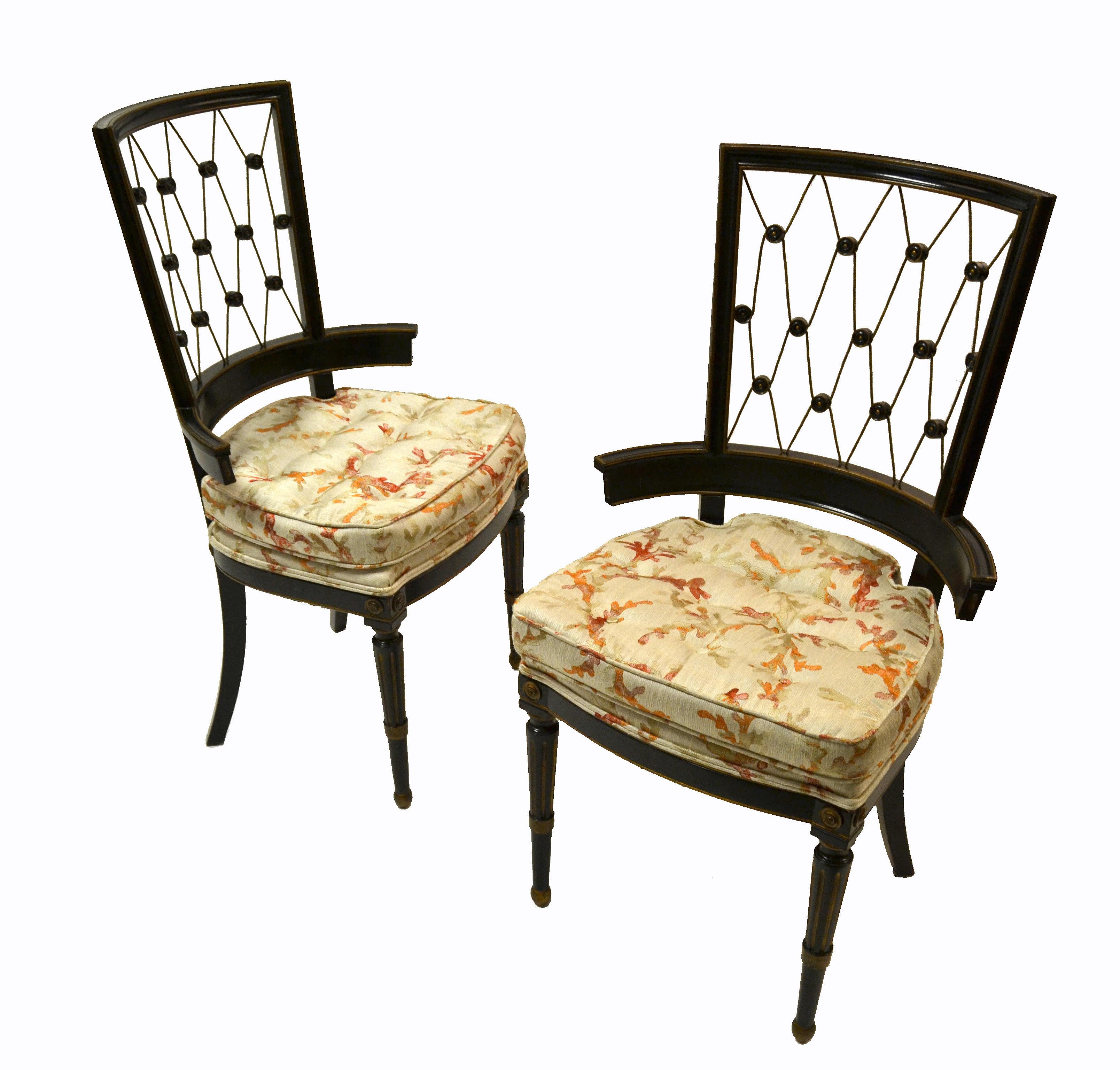 A pair of 1940s American Side Chairs Intricate diamond pattern back armchairs in black and gold.
Very elegant open-vented Back armchairs with feminine curved frame in an ebonized finish with Gold finished details. Tone on tone tufted seating.