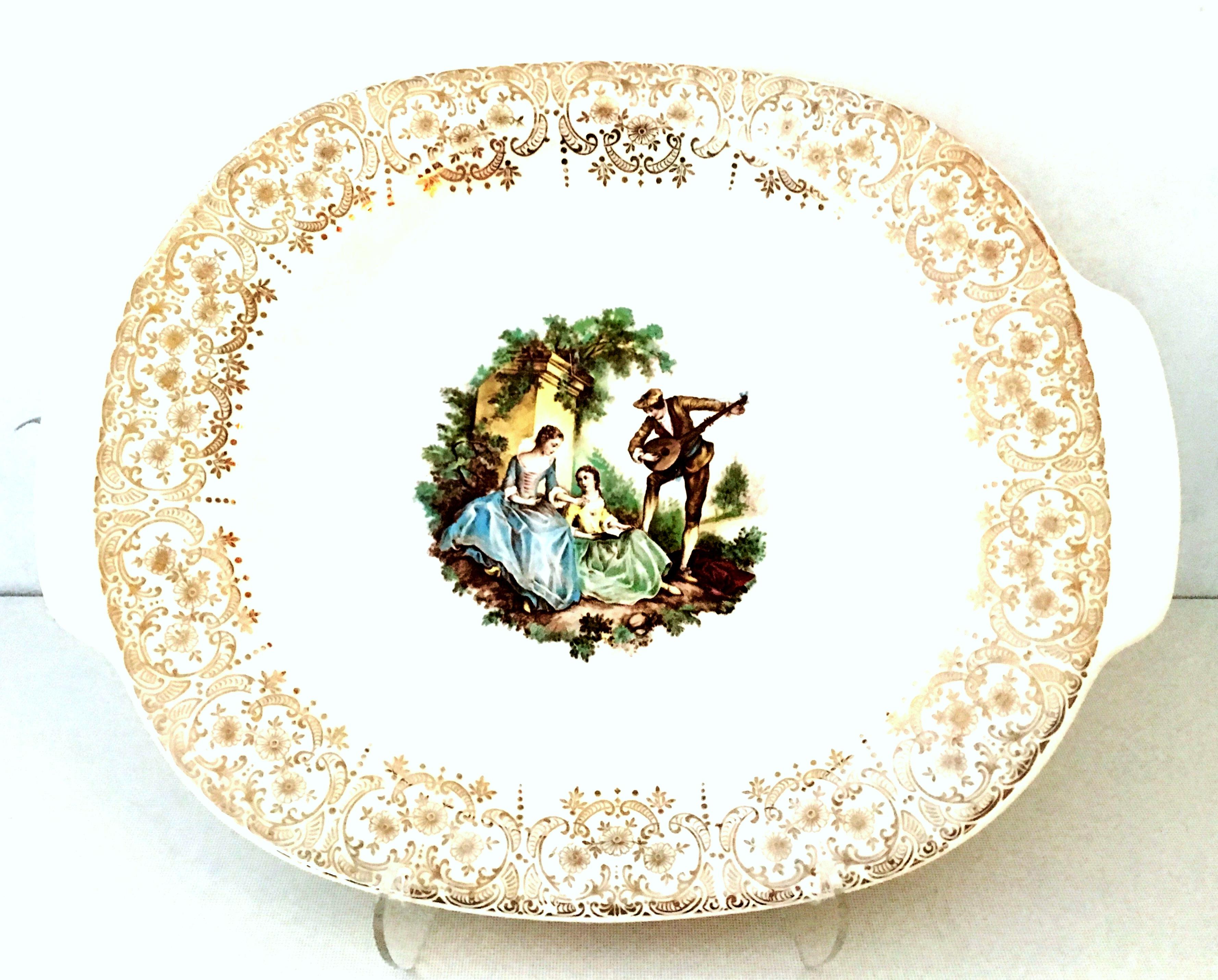 1940s set of three American Limoges ceramic and 22-karat gold handled serving platters in the 