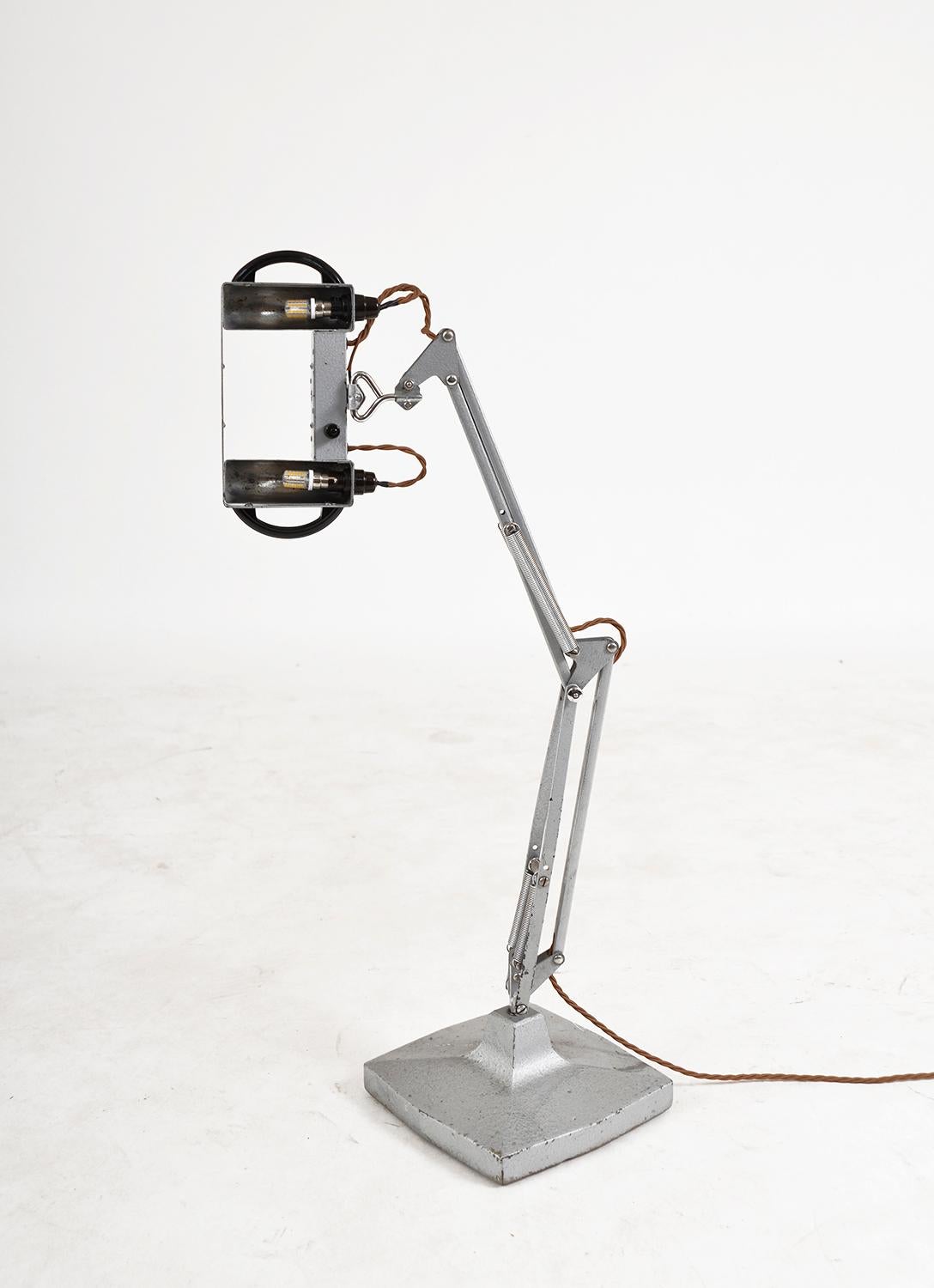 anglepoise magnifying lamp
