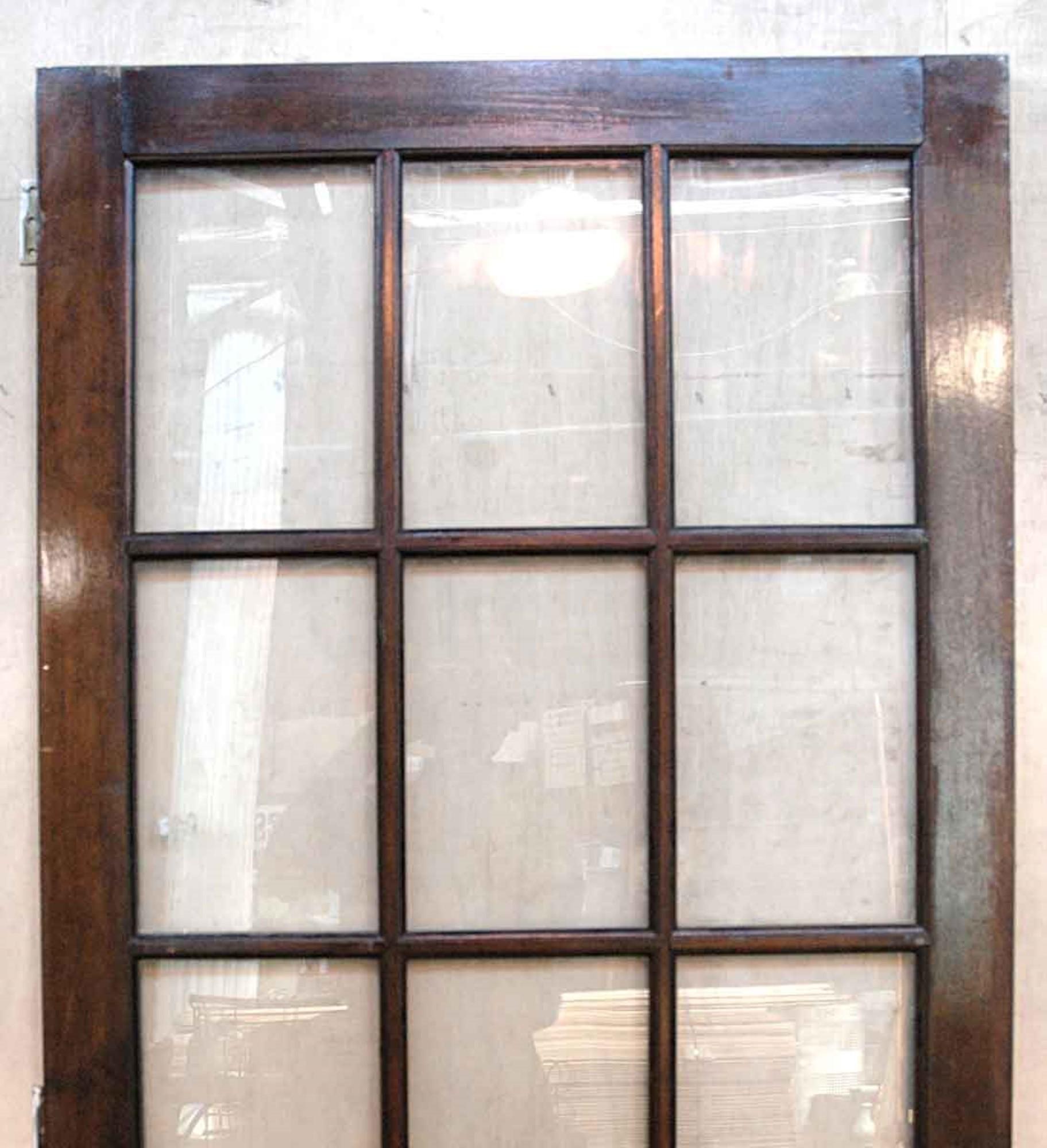 1940s birch right hand French door with 15 lites done in a dark stain. Comes with three brass hinges. This can be seen at our 400 Gilligan St location in Scranton. PA.
