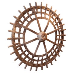 1940s Antique Industrial Cast Iron Wheel with Curved Spoke Design