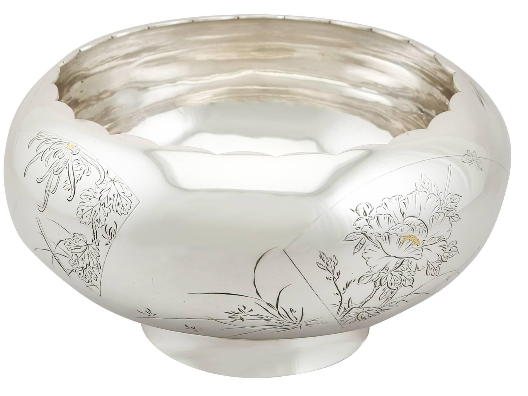 An exceptional, fine and impressive antique Japanese silver presentation bowl; part of our Asian silverware collection.

This exceptional antique Japanese silver bowl has a circular rounded form onto a plain tapering circular collet foot.

The