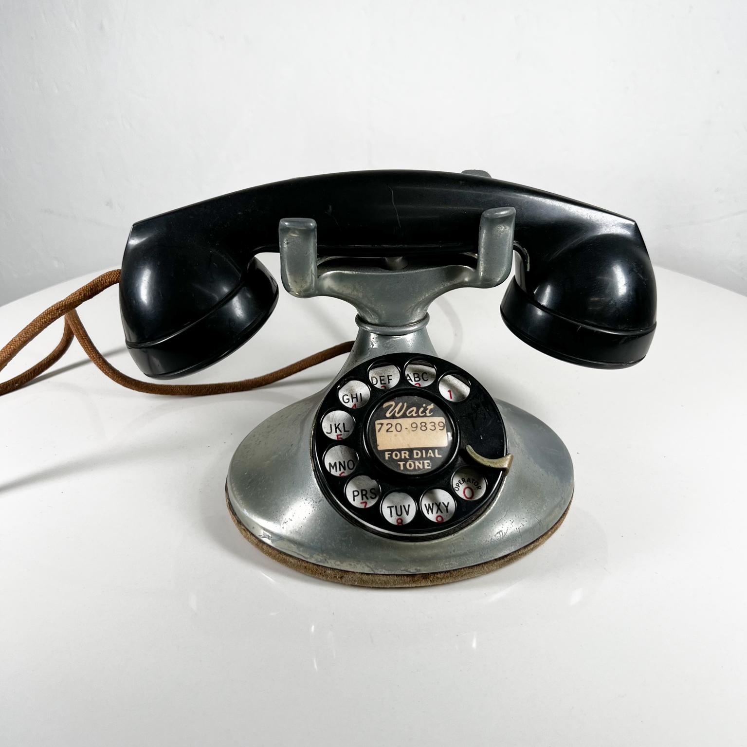 1940s Antique Silver Telephone Western Electric Bell System 
Rotary dial vintage Phone with ringer untested.
9 w x 5 d x 5 h
Selling as is presented vintage untested condition.
See all images.


