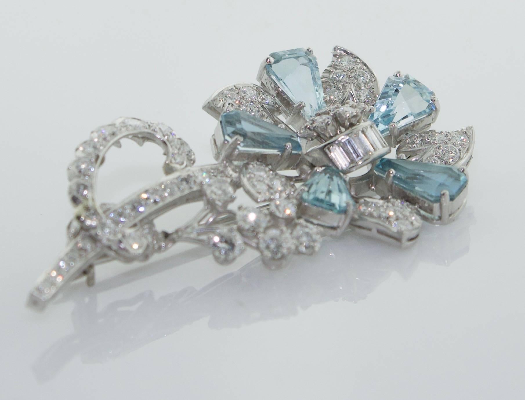 1940's Aquamarine and Diamond Flower Brooch in Platinum
Five Calf's Head Cut Aquamarines Weighing 4.50 carats (approximately)
Sixty Eight Diamonds Weighing 2.40 carats (approximately)
Excellent Diamond Quality  GH VVS-VS1
The Workmanship is