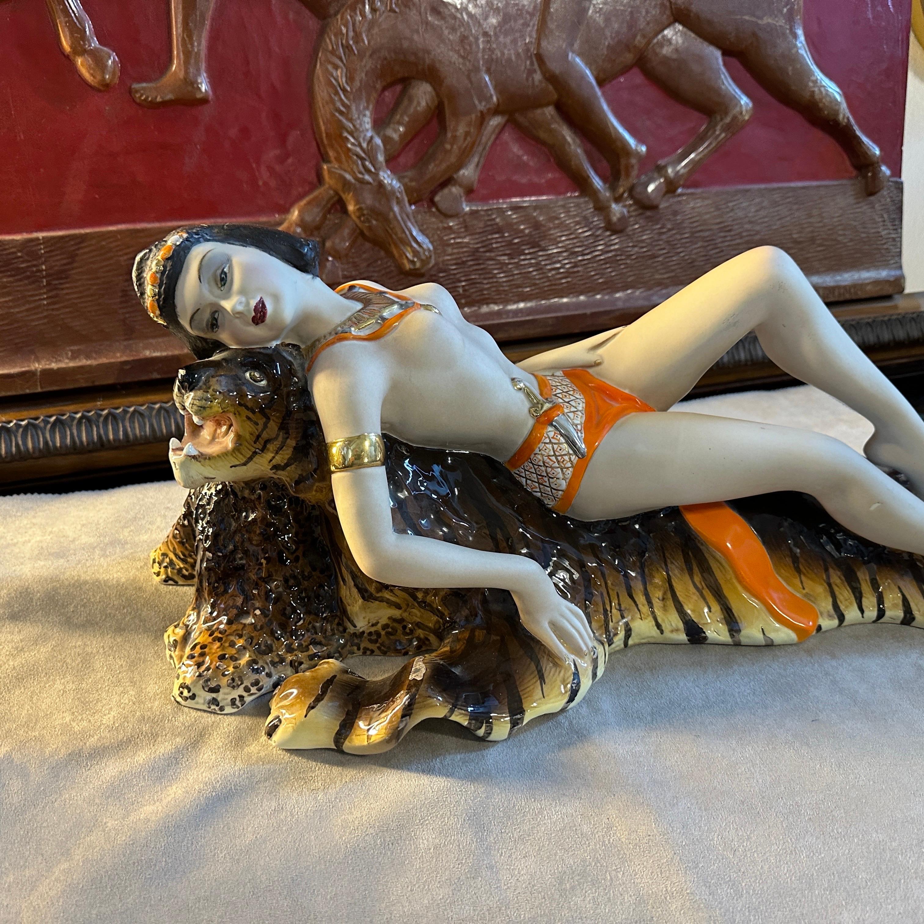 Italian 1940s Art Deco Ceramic Figure of an Amazon lying on a Tiger Skin by Corsaro For Sale