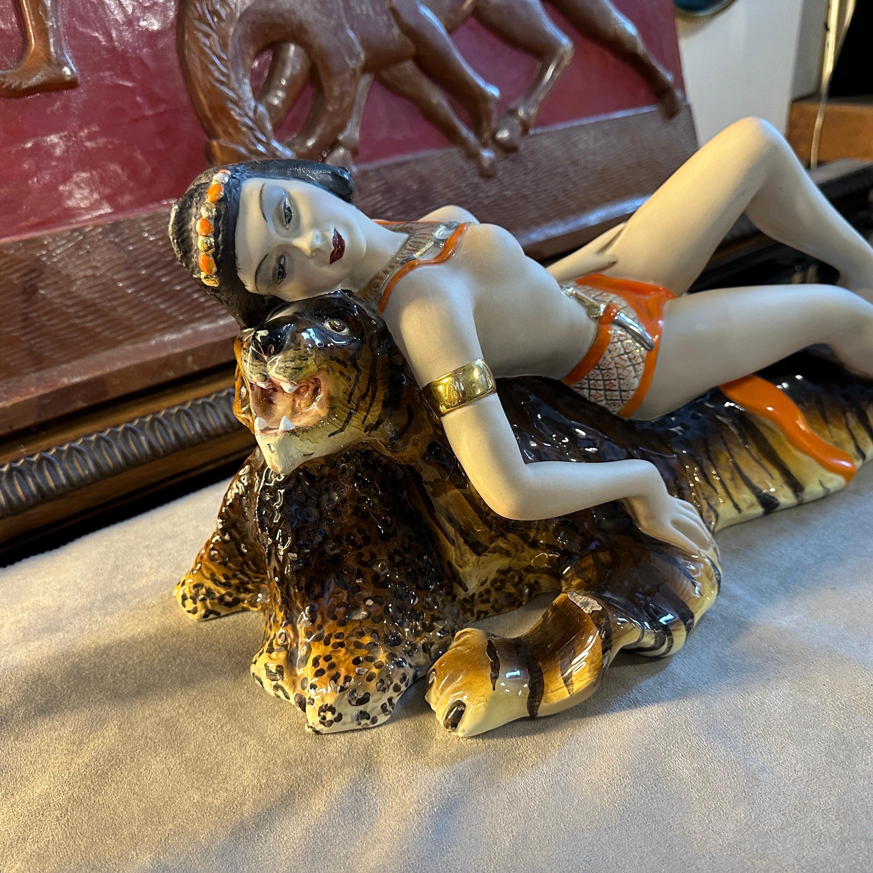 Hand-Painted 1940s Art Deco Ceramic Figure of an Amazon lying on a Tiger Skin by Corsaro For Sale