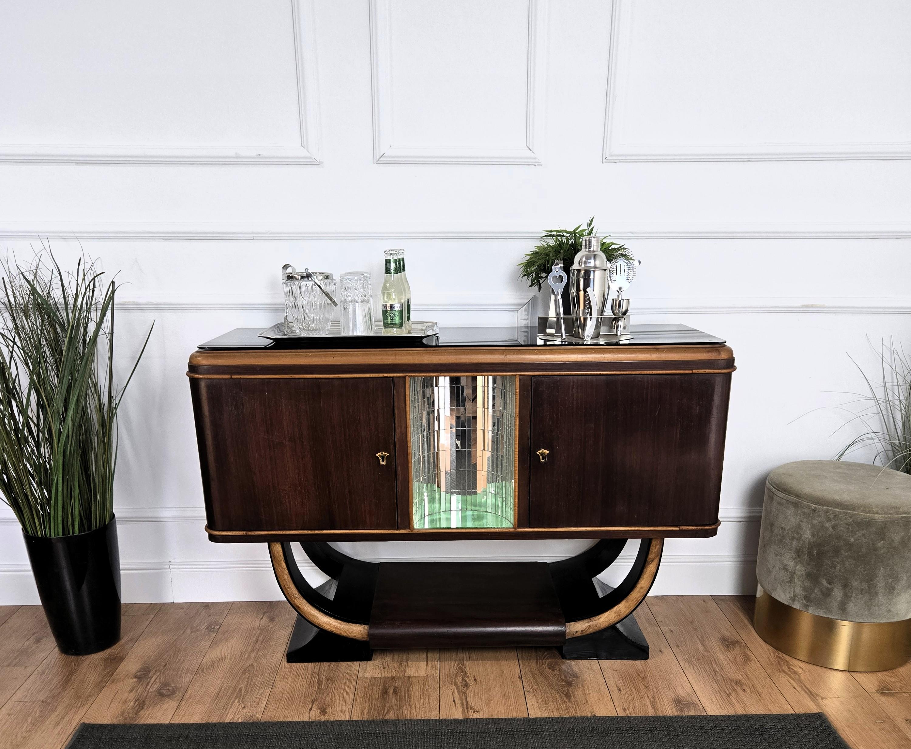 Unique and very elegant Italian Art Deco Mid-Century Modern dry bar cabinet, in beautiful veneer walnut wood, with two side doors and amazing central part in mirrors mosaic, black glass top and antique carved wood handles. The unique and typical