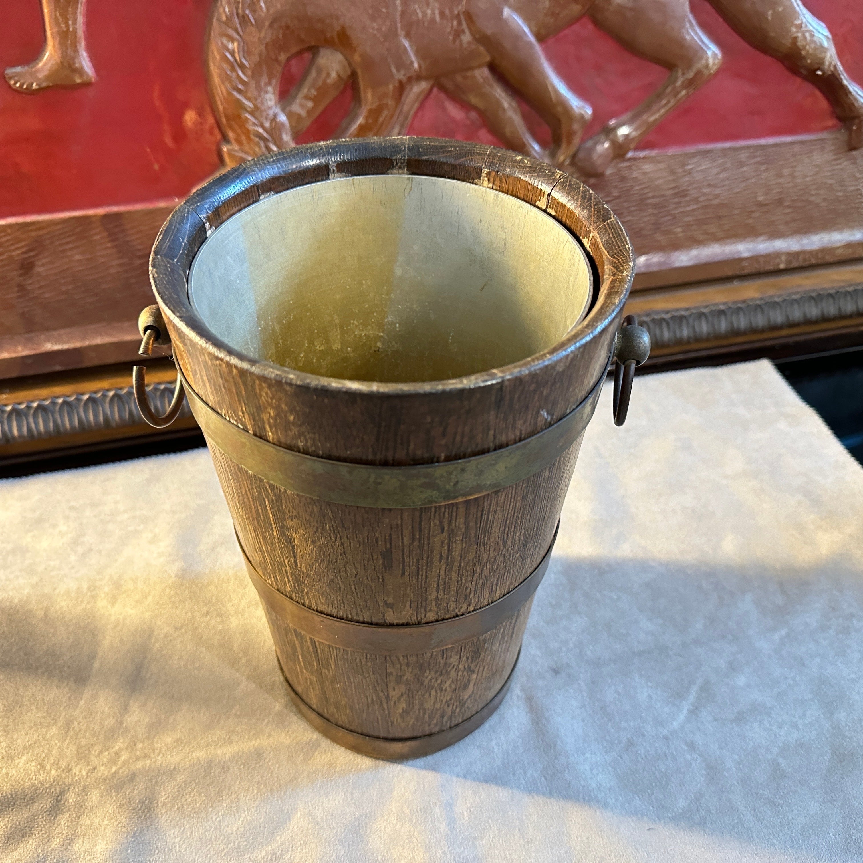 An amazing oak and copper wine cooler hand-crafted in France by Geraud Lafitte in the Forties, it's in original condition with normal signs of use and age, marked on a side Geraud Lafitte 