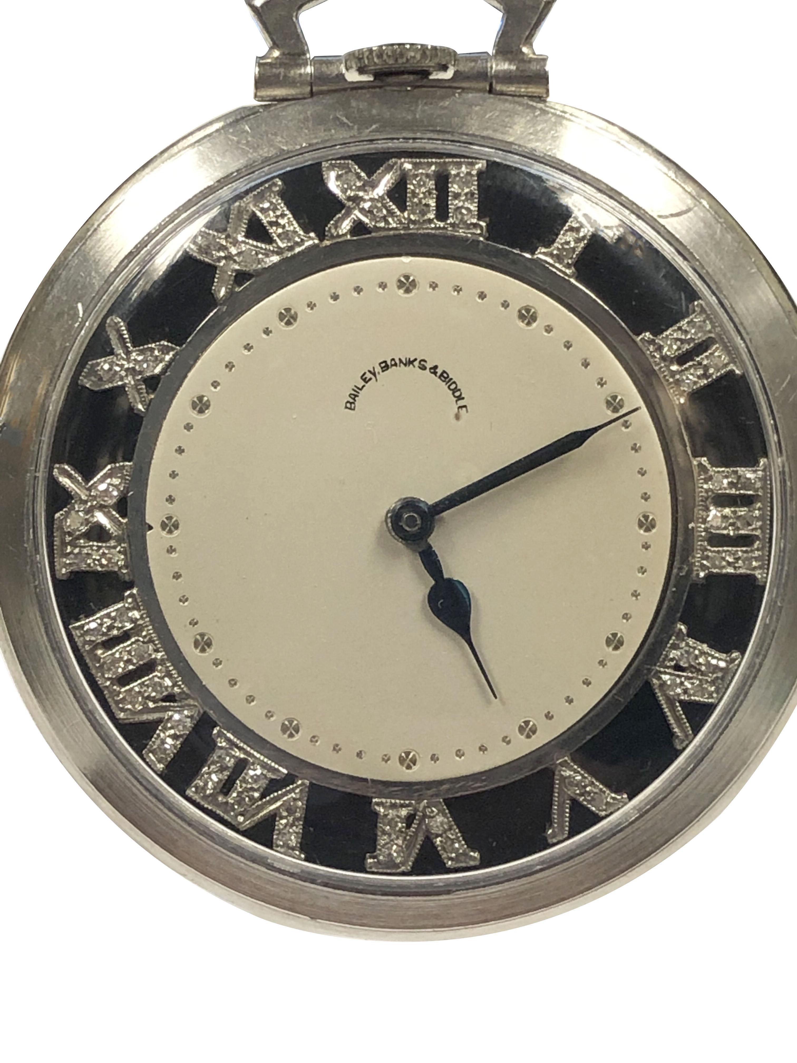 Circa 1930s Art Deco Pocket Watch, for Bailey Banks & Biddle, 42 M.M. Diameter and 8 M.M. thick 3 piece Platinum case, 17 Jewel Mechanical, Manual wind Nickle Lever movement by Max Landau Switzerland. Silver Satin center dial and a Black outer ring