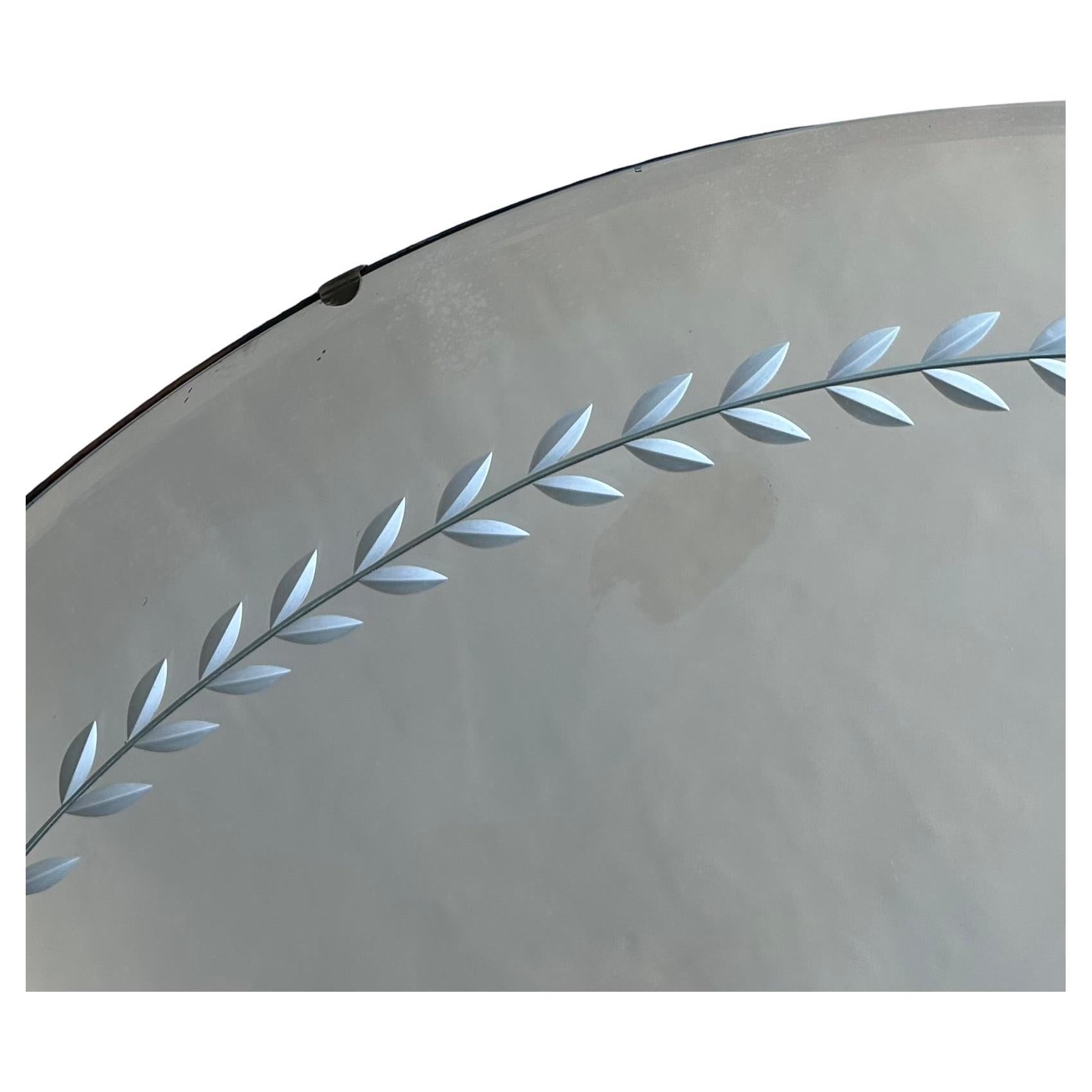 1940s Art Deco Round Wheel Cut Mirror, Backed with Board

Offered for sale is an Art Deco round wheel cut and polished mirror which is backed with board, wired and ready to hang.  This mirror is a recent acquisition from a Upper West Side New York