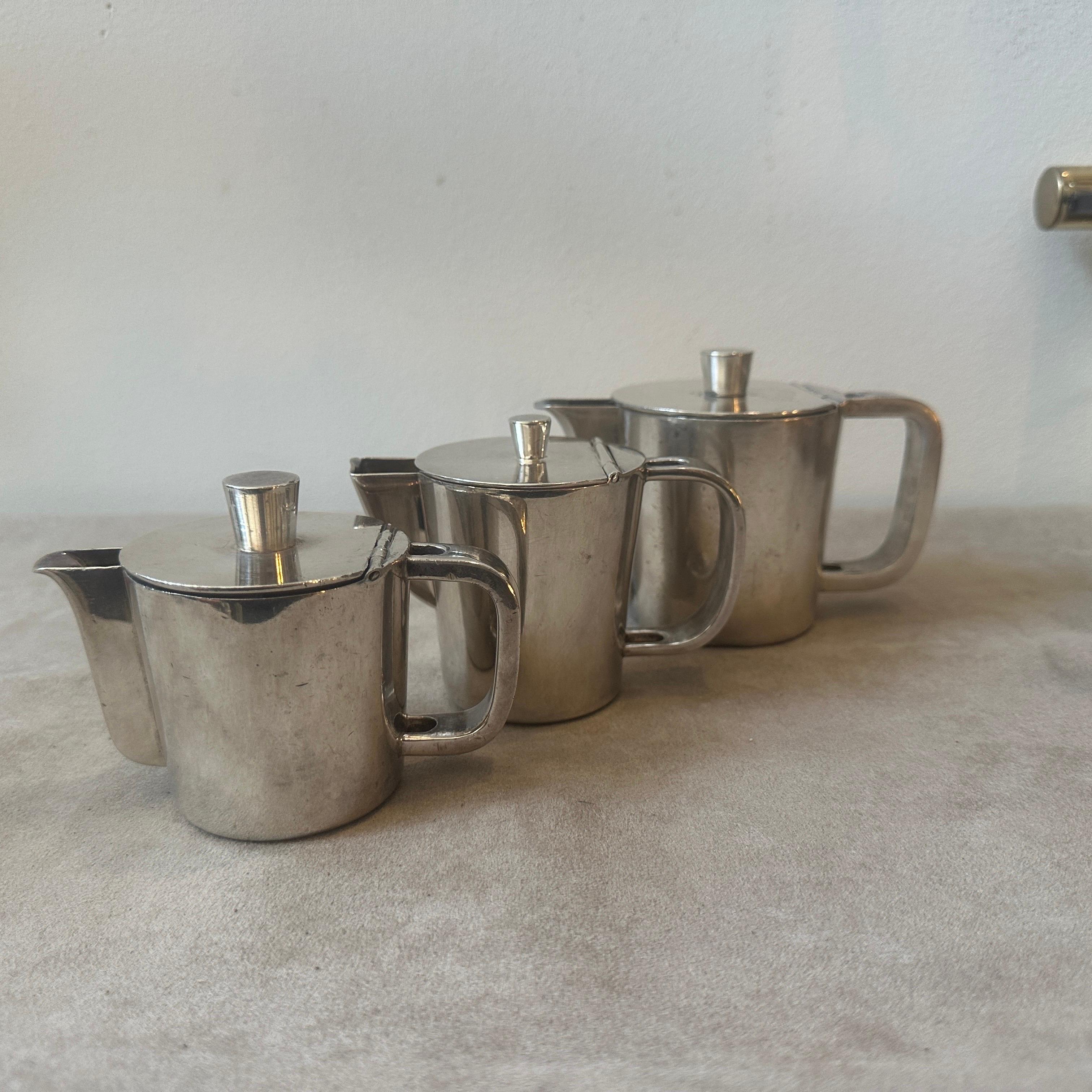 A set of three alpaca coffee pot designed by Gio Ponti and manufactured by Krupp Milano in the Forties, they were used in the hotels and they are marked on the bottom Krupp and Jolly Hotels Italia, they are in original conditions with normal signs