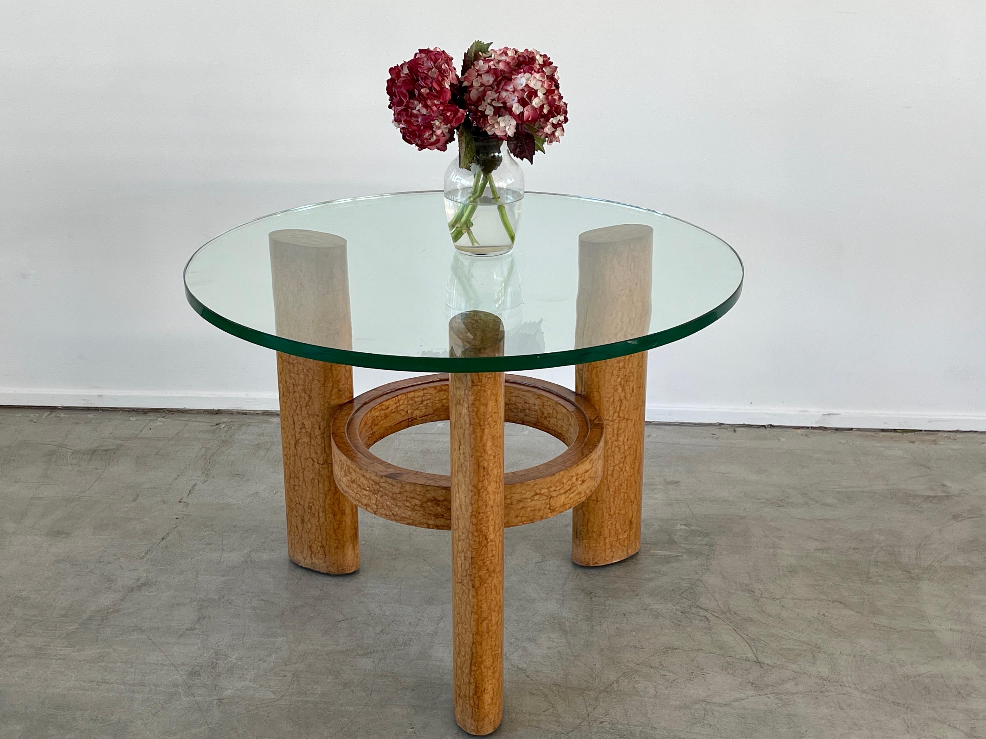 1940's Art Déco tripod coffee table with wooden legs in light briar and original circular glass top. 
Italy, 1940s.