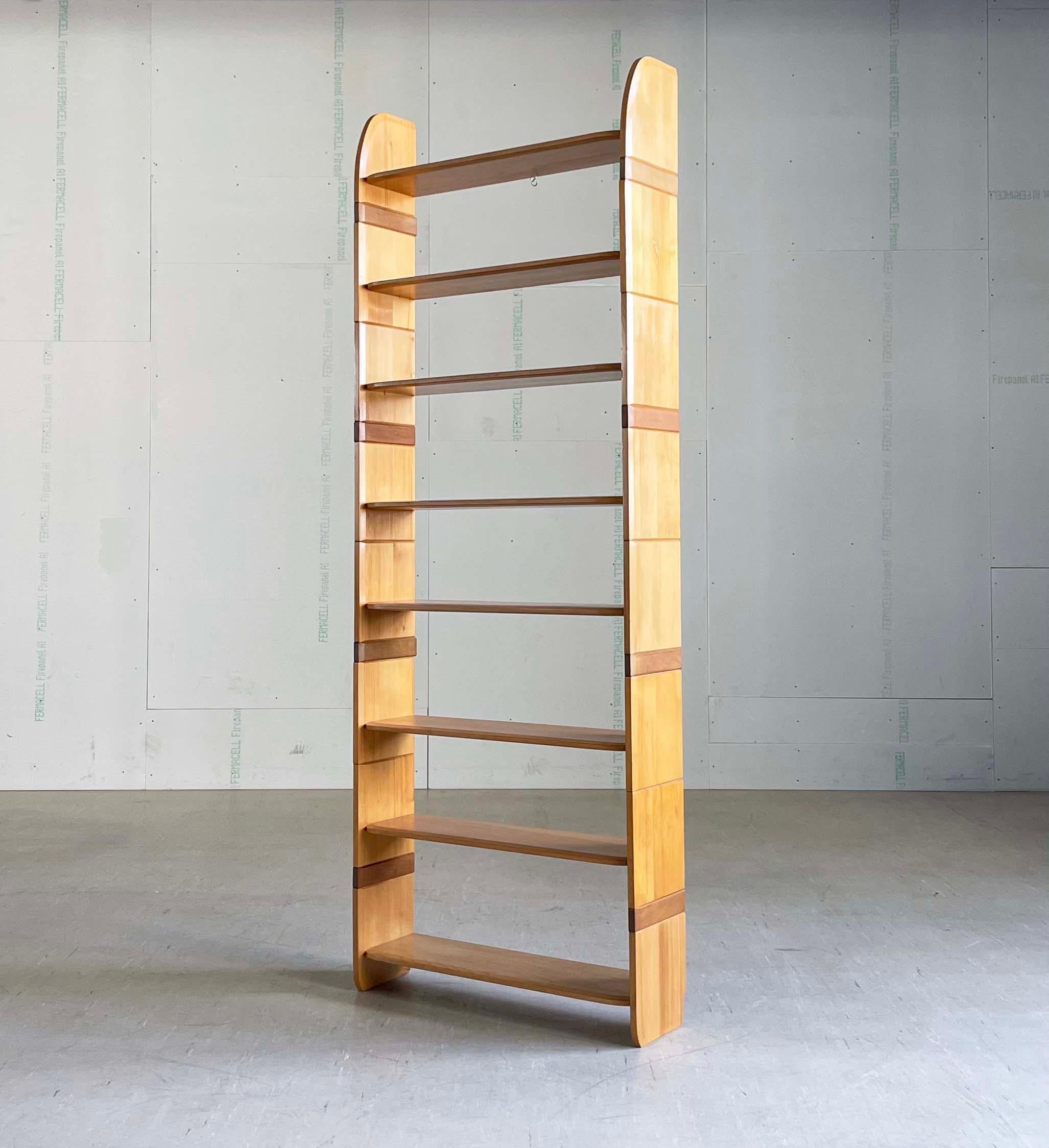 1940's Arthur Milani Modular Wall Shelving for Wohnhilfe, Switzerland. Consists of eight stackable shelves in addition to four pairs of spacers for height adjustment enabling storage of larger / smaller books or decor as necessary. The modular
