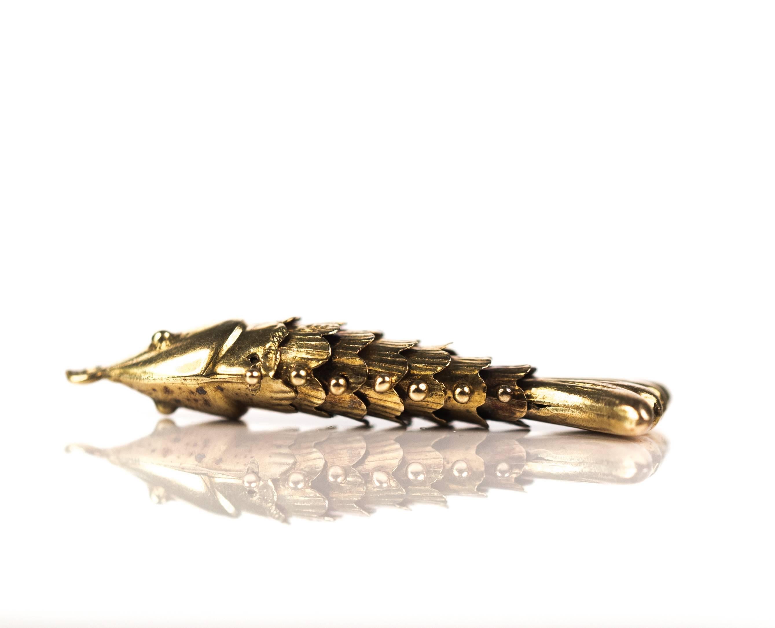 articulated fish charm
