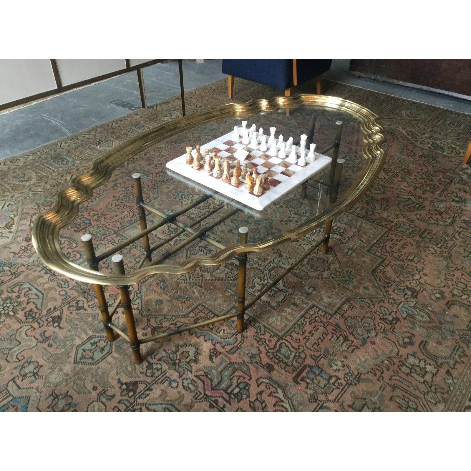 Stunning 1940s gilded coffee table with a light bamboo base.