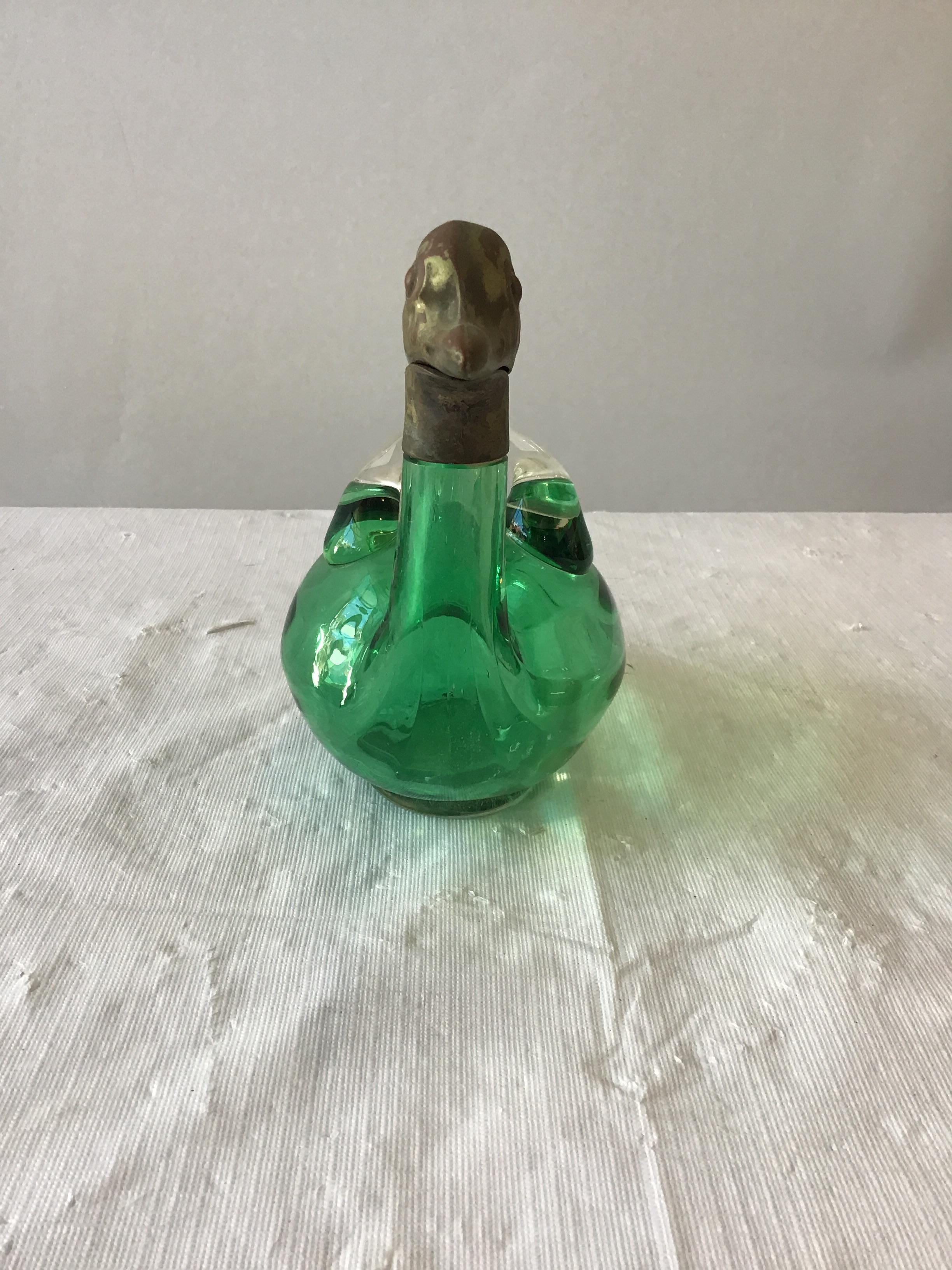 1940s Austrian art glass duck decanter with brass head.
Stamped Austria on head.