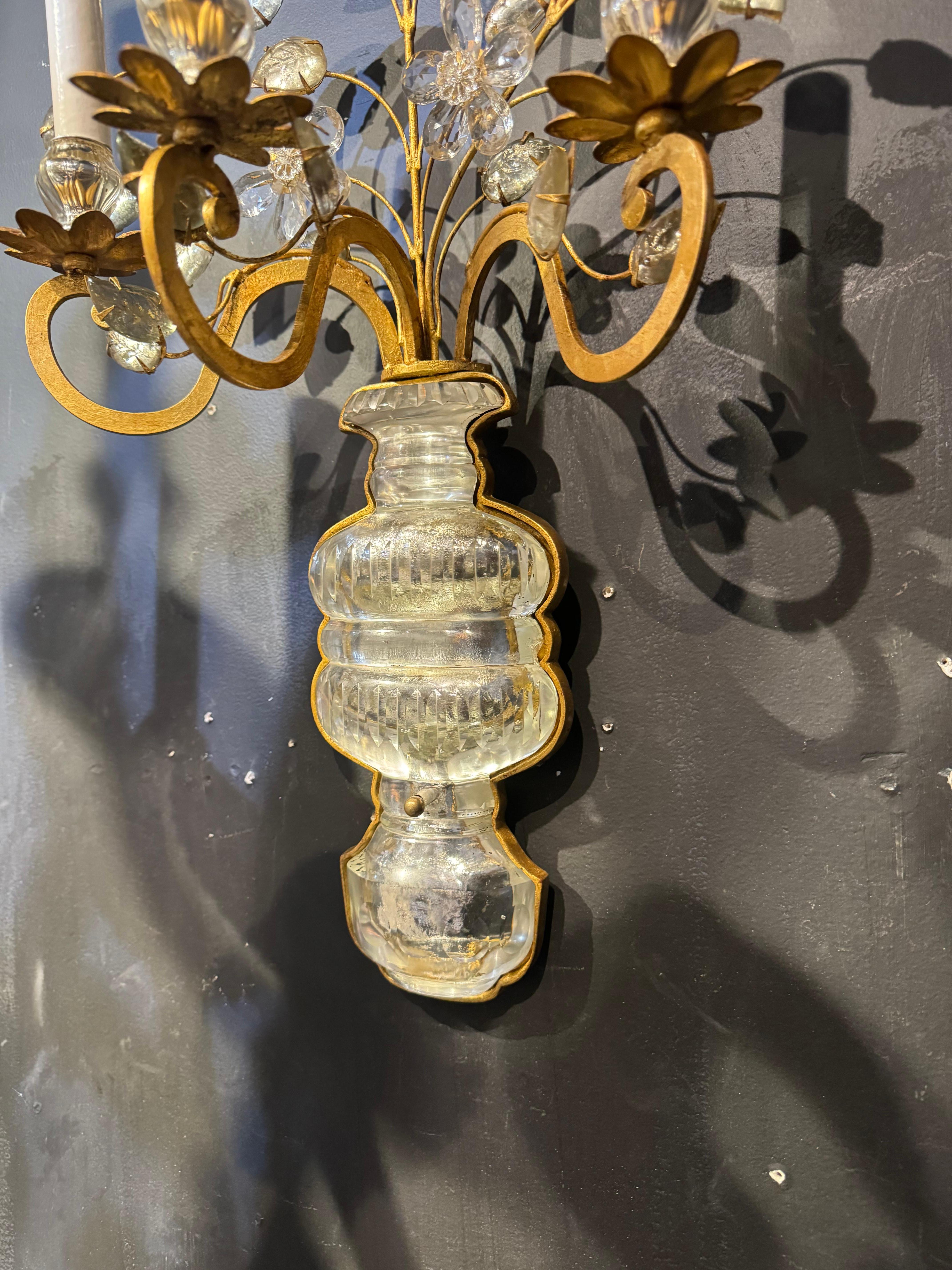Beautiful pair of of 1940’s French large Bagues gilt metal sconces with a big crystal base on body and glass leaves. 3 lights
