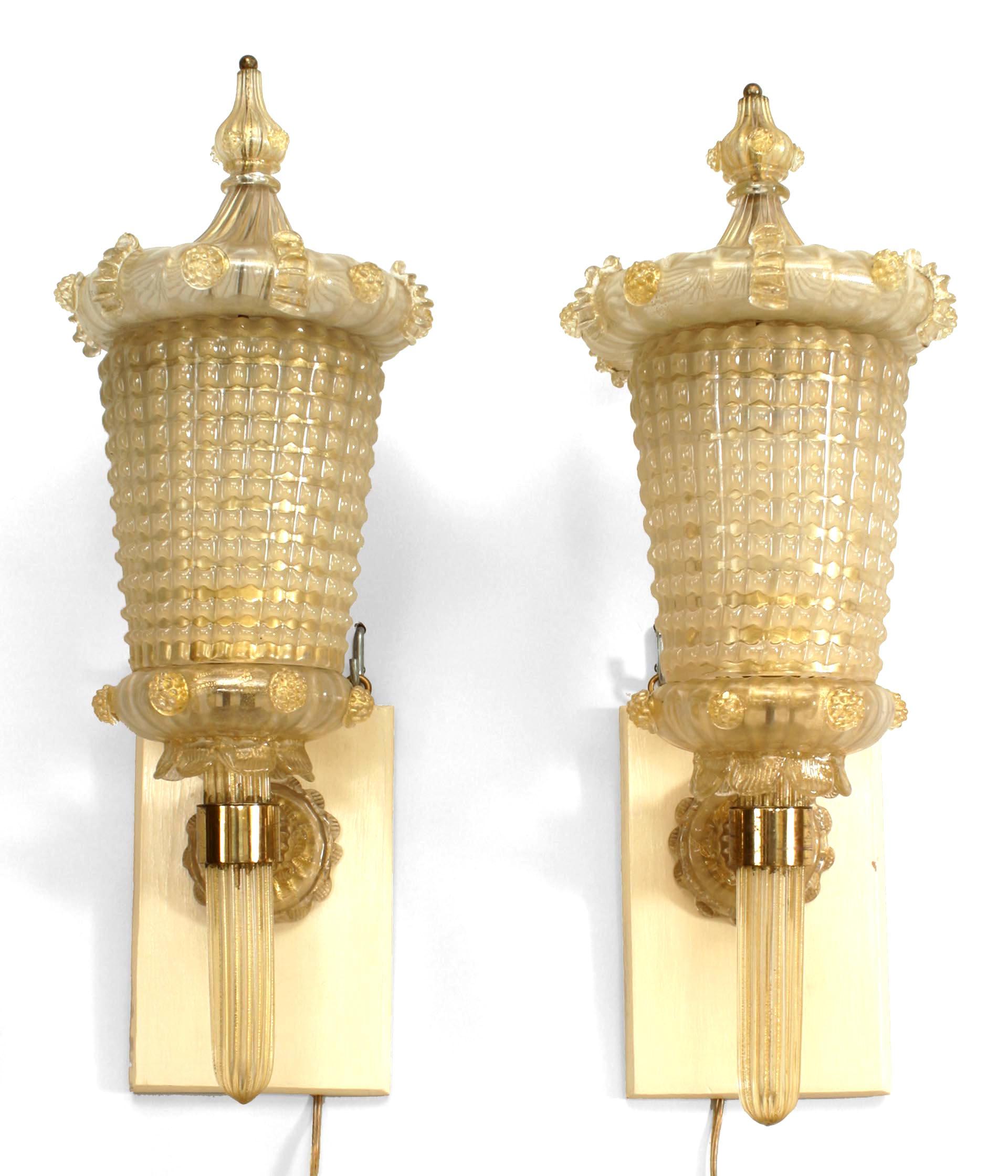 Pair of Italian Mid-Century (1940s) Venetian Murano gold glass wall lanterns with finial tops with brass bracket supports. (attributed to BAROVIER E TOSO) (PRICED AS Pair)
