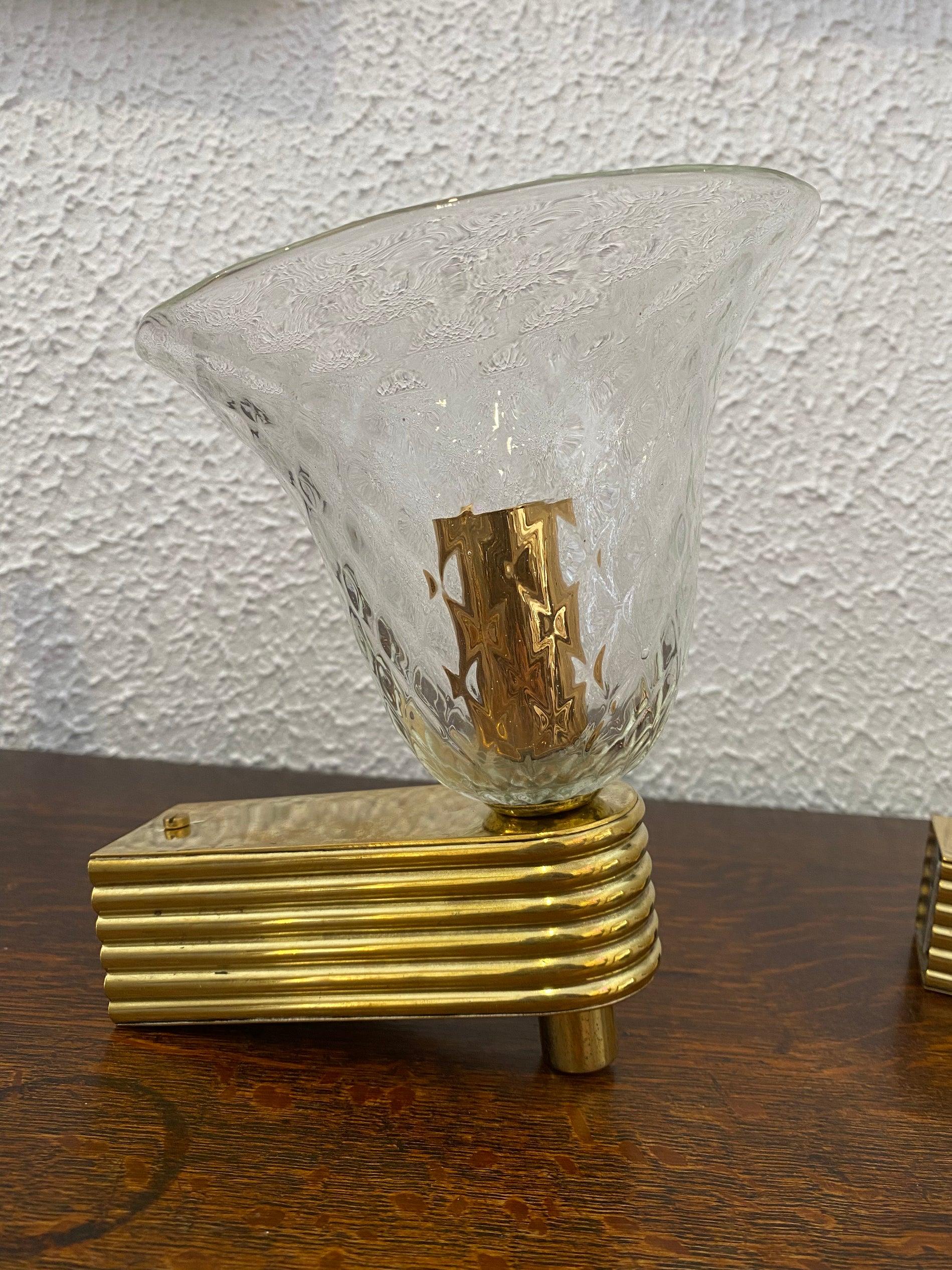 A pair of beautiful 1940s Murano & Brass Sconces manufactured in Venice, Italy. Mouth blown crystal with extreme transparency and brightness. Rewired to Australian standards. In excellent vintage condition. 