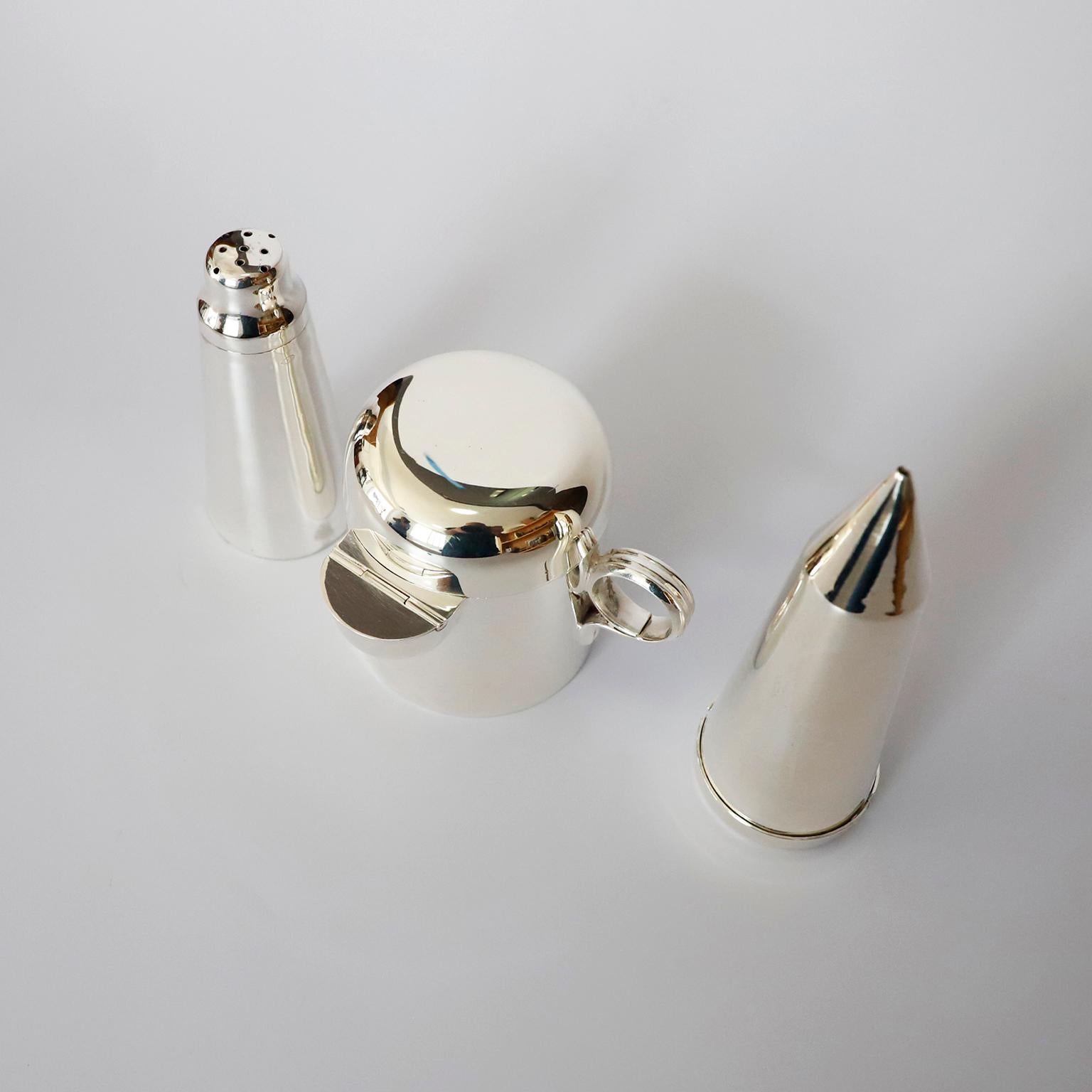 Circa 1940. We offer this Bauhaus, salt, pepper and sugar set, made in Germany. Each piece includes marks 