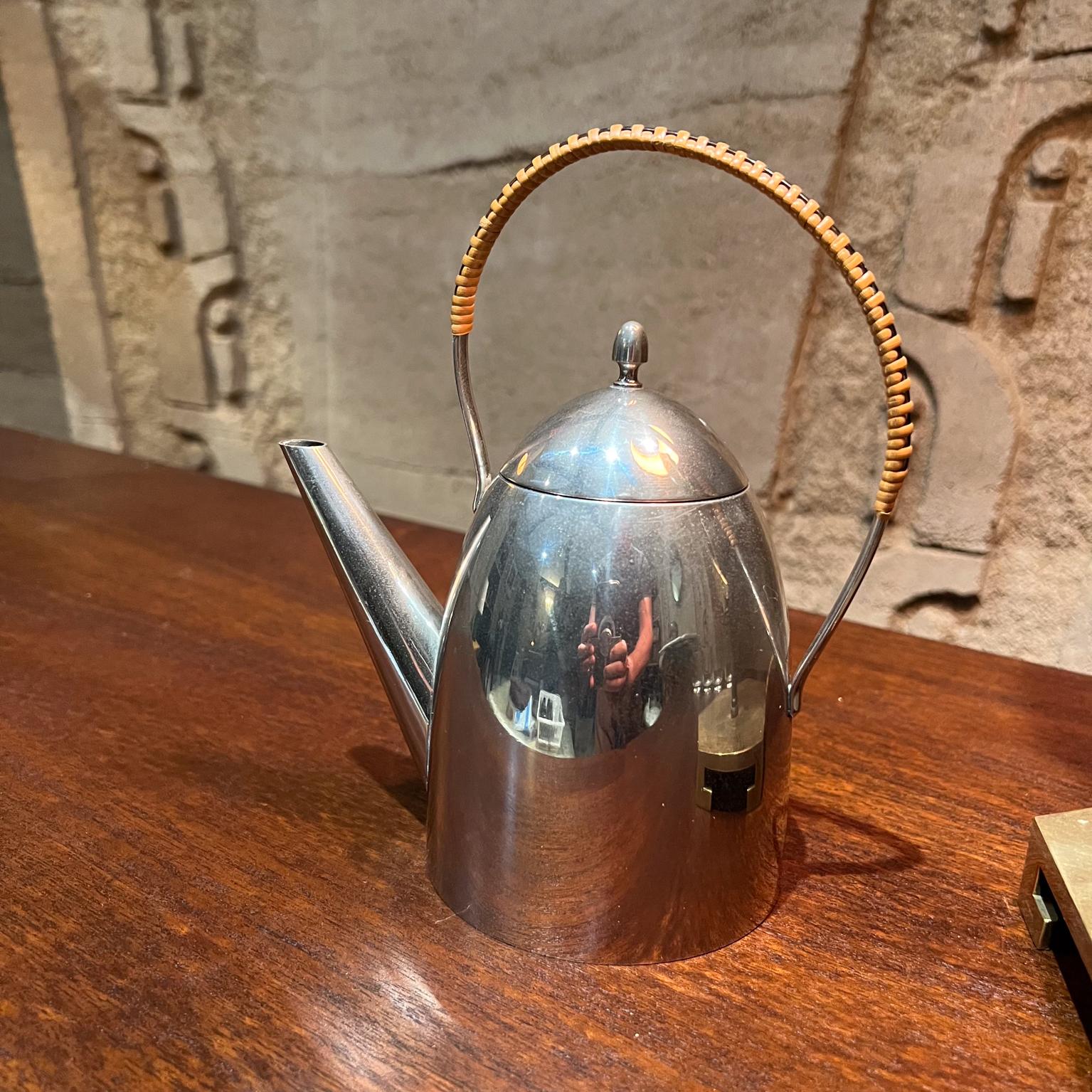 D & S Personal Tea Kettle Pot Stainless Steel. 
Bauhaus clean Modern Design style of Peter Behrens
Handle with cane wrap
Very clean vintage gently used condition.  
Stamped at the bottom. 
See all images shown.
