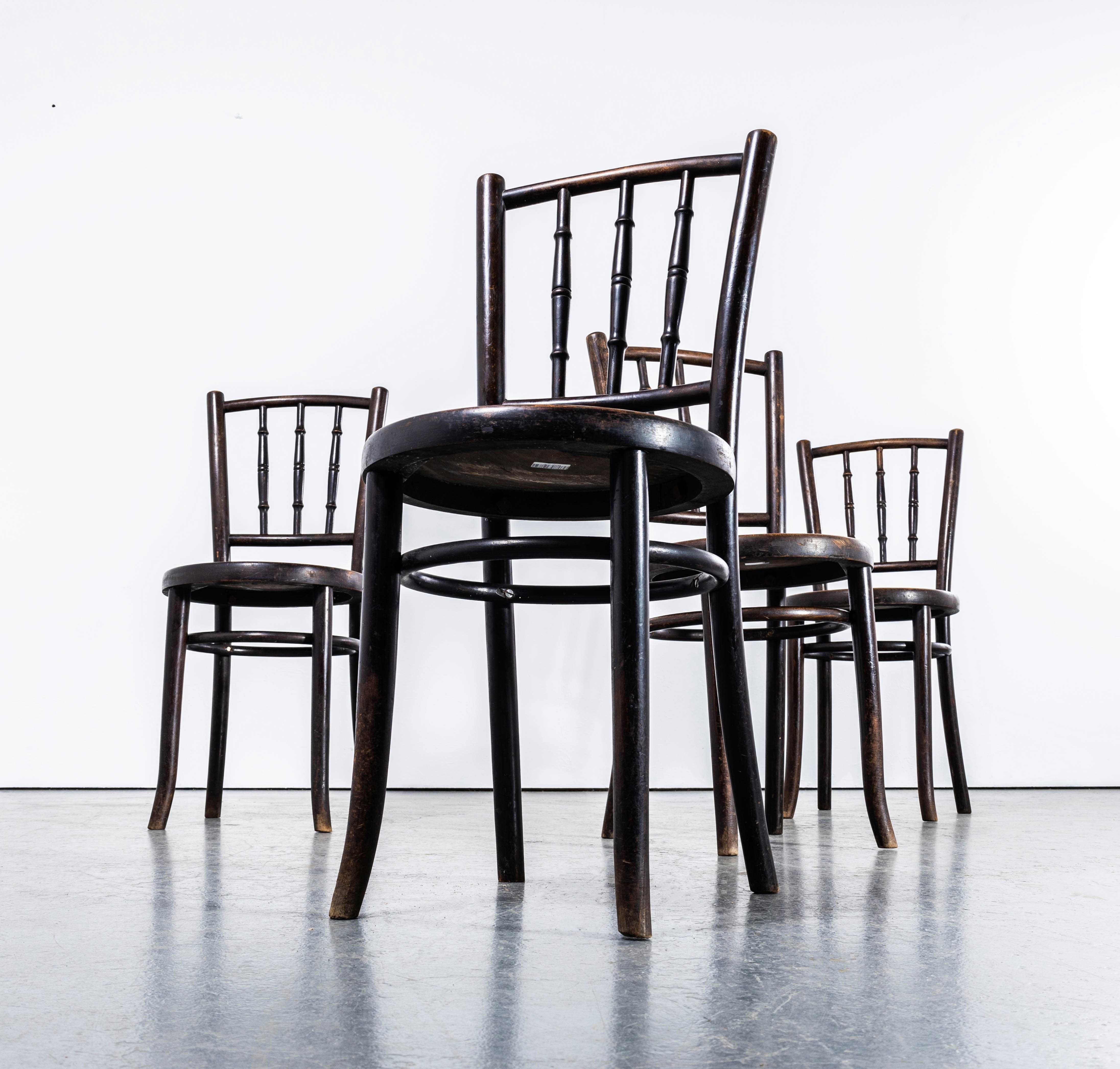 1940's Bentwood Debrecen Dining Chairs - Set Of Four. 

It is hard to be precise about the origin of these chairs as little history is known, but what we do know is at the beginning of the 20th Century two producers existed J&J Kohn and Mundus. Both