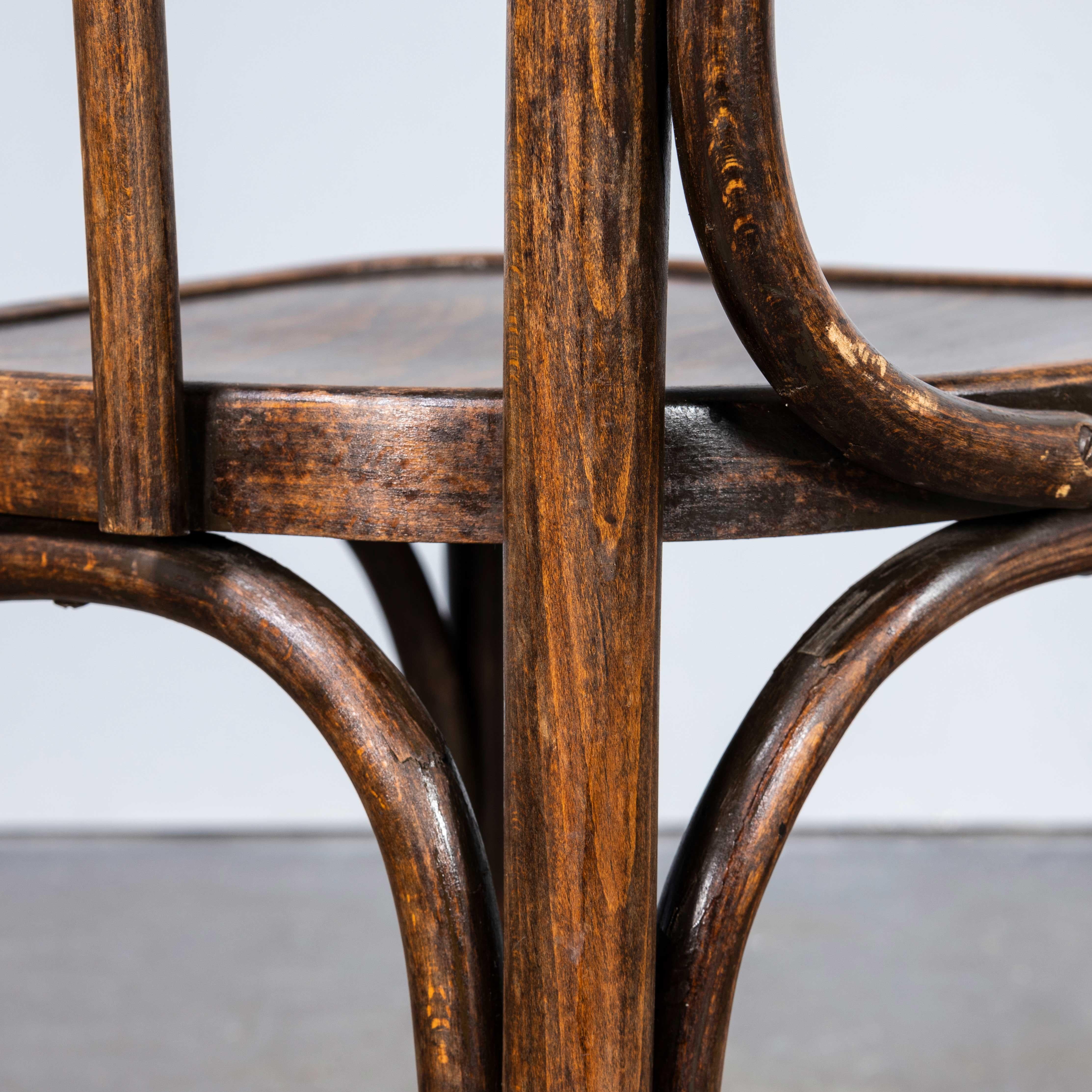 1940's Bentwood Debrecen Thonet Classic Back Dining Chairs - Set Of Twelve
1940's Bentwood Debrecen Thonet Classic Back Dining Chairs - Set Of Twelve. Rare mixed set of twelve chairs by the producers Debrecen and Thonet, it is is hard to be precise