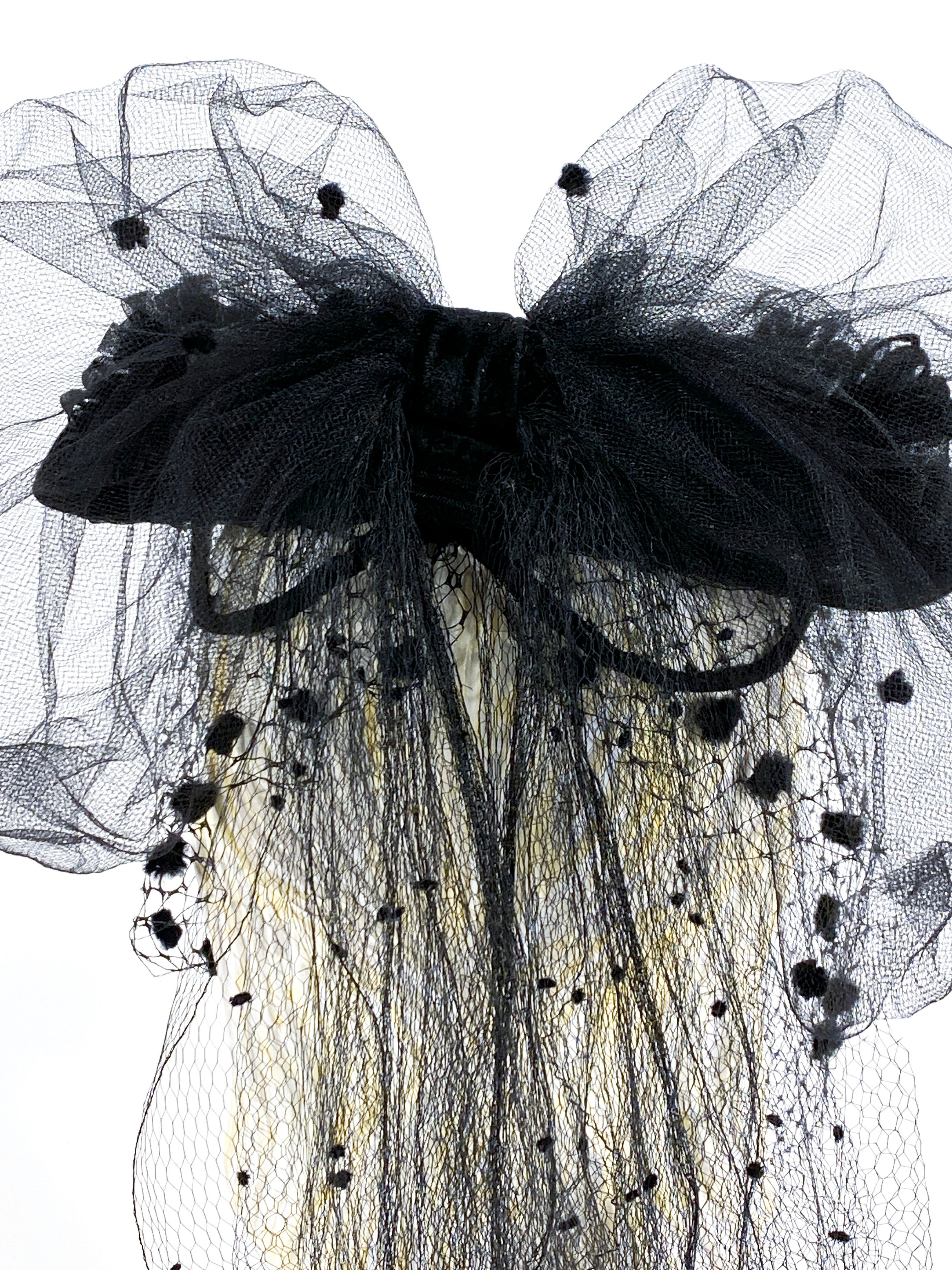 vintage black hat with netting veil