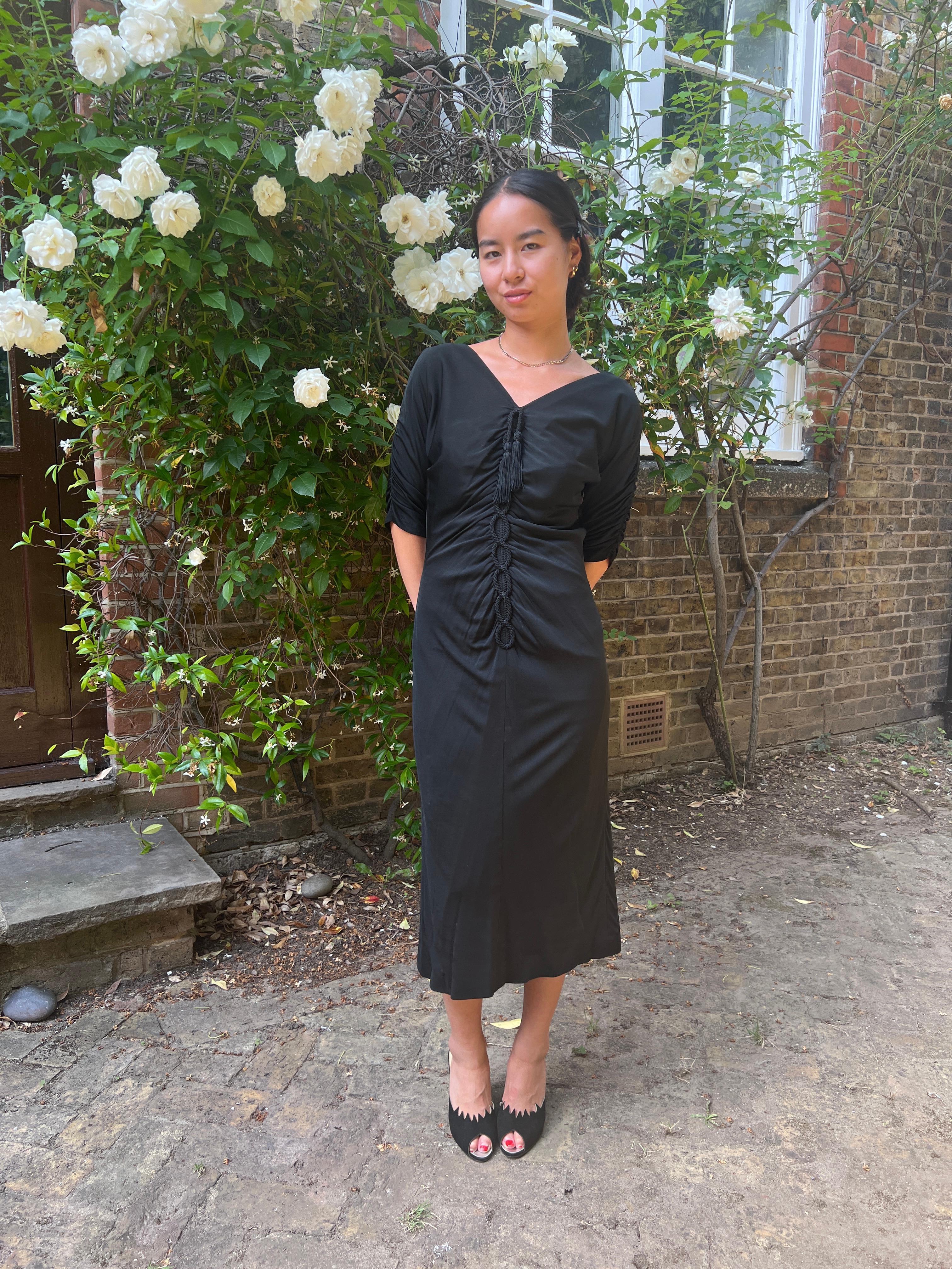 1950s Black Jersey and Twisted Tassel Wiggle Dress For Sale 1