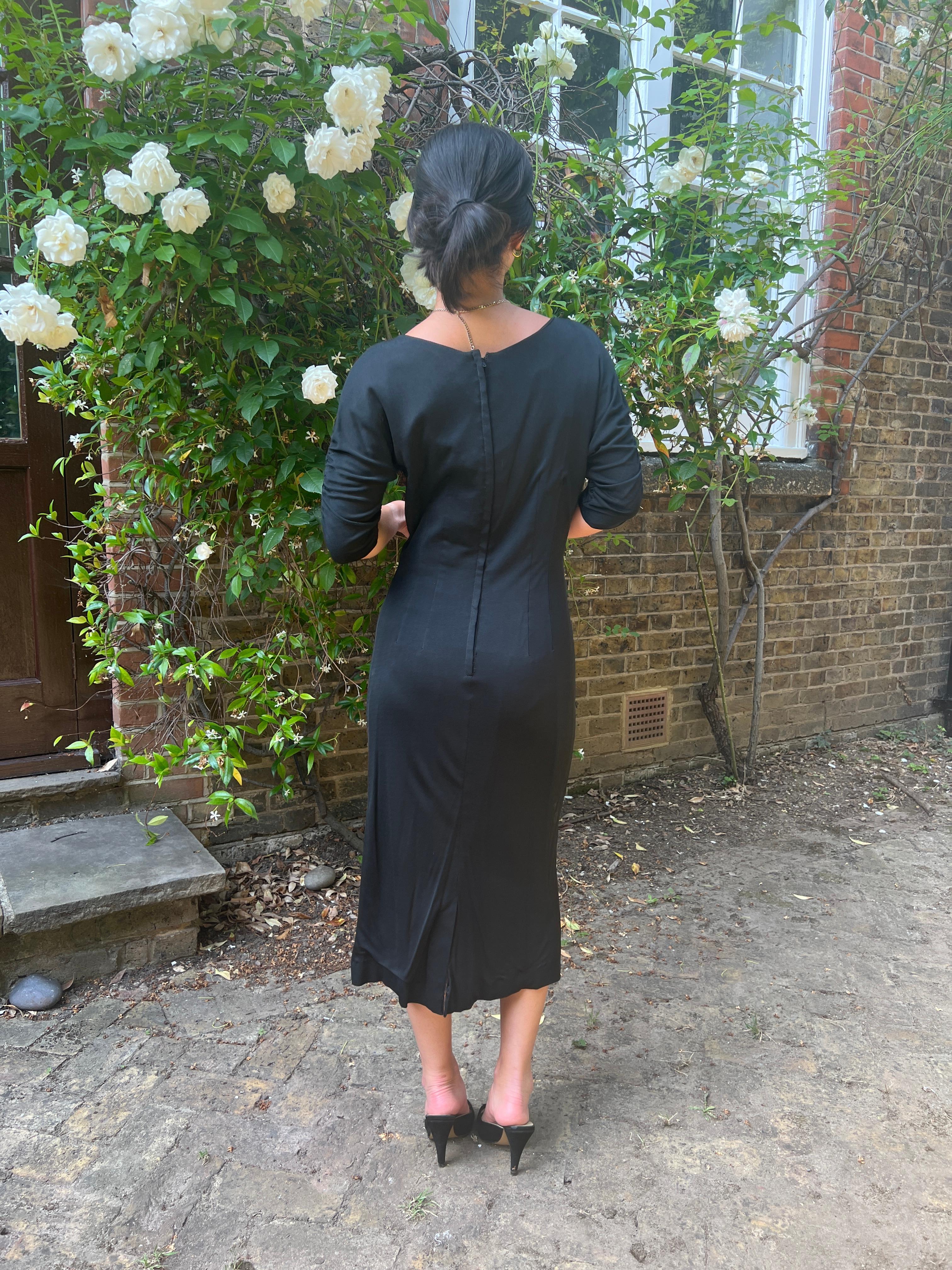 1950s Black Jersey and Twisted Tassel Wiggle Dress For Sale 2